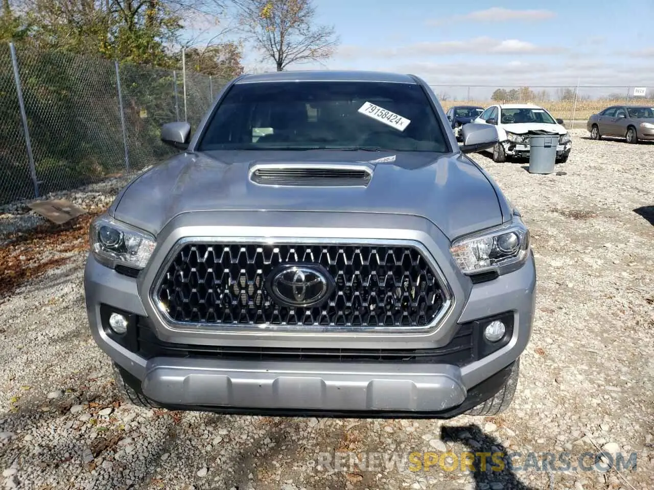 5 Photograph of a damaged car 3TMCZ5AN7KM235358 TOYOTA TACOMA 2019