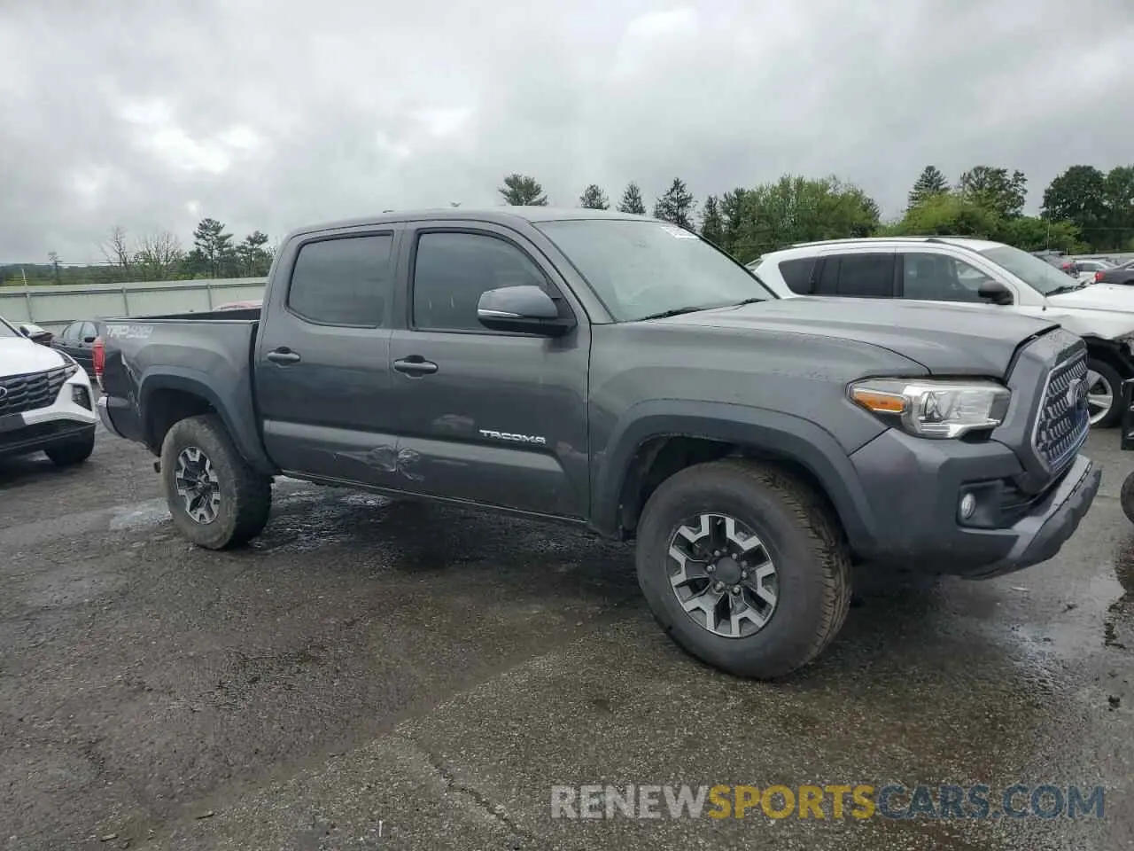 4 Photograph of a damaged car 3TMCZ5AN7KM236400 TOYOTA TACOMA 2019