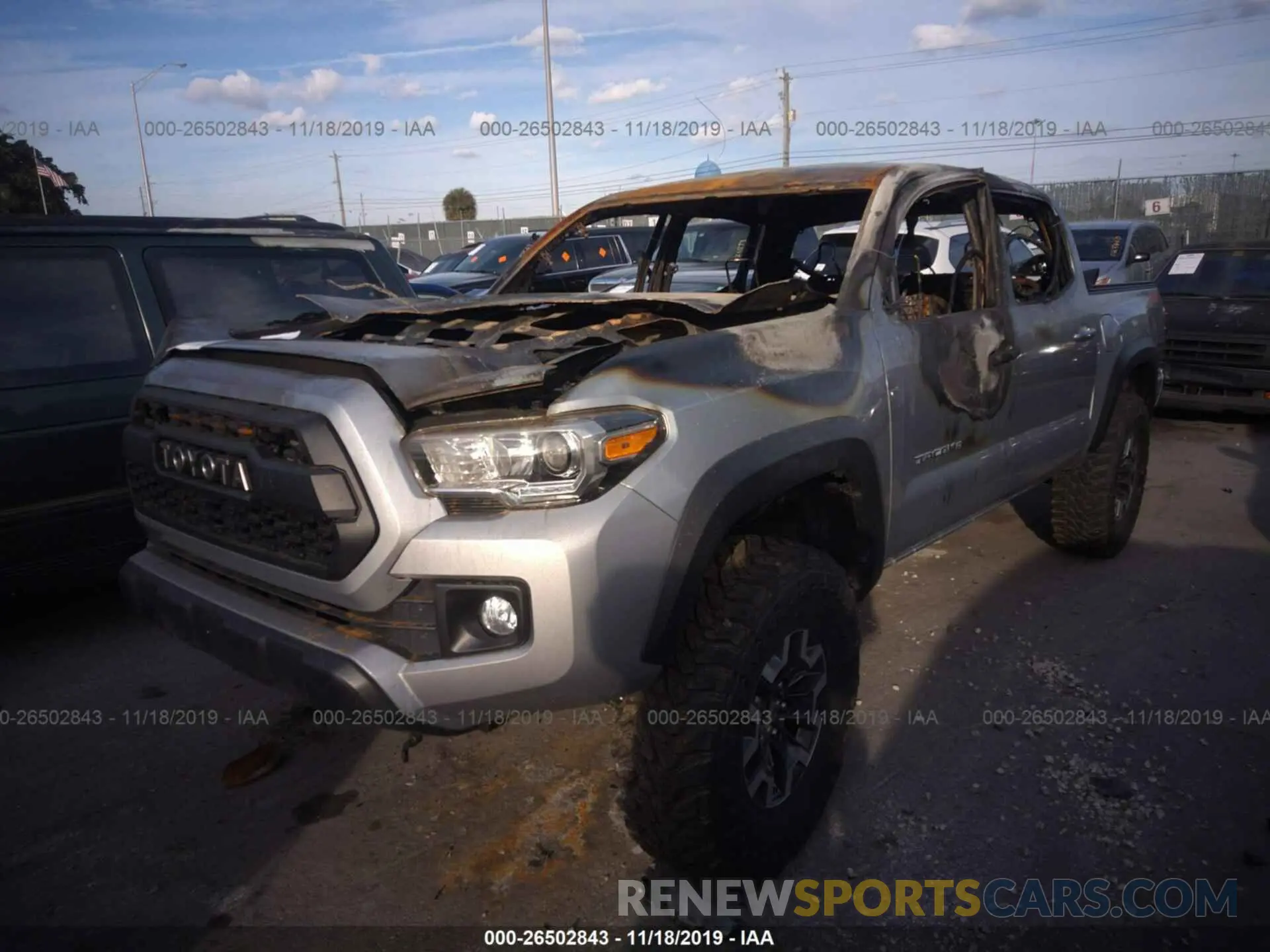 2 Photograph of a damaged car 3TMCZ5AN7KM253536 TOYOTA TACOMA 2019
