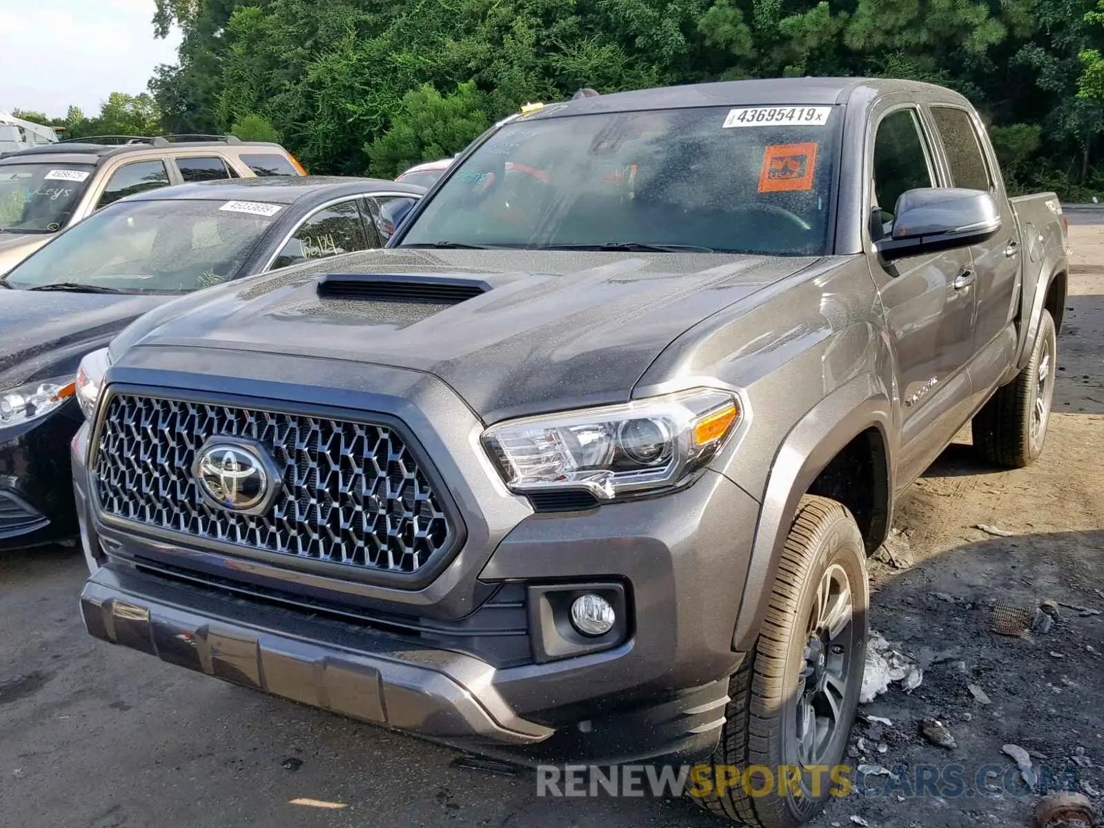 2 Photograph of a damaged car 3TMCZ5AN7KM257358 TOYOTA TACOMA 2019