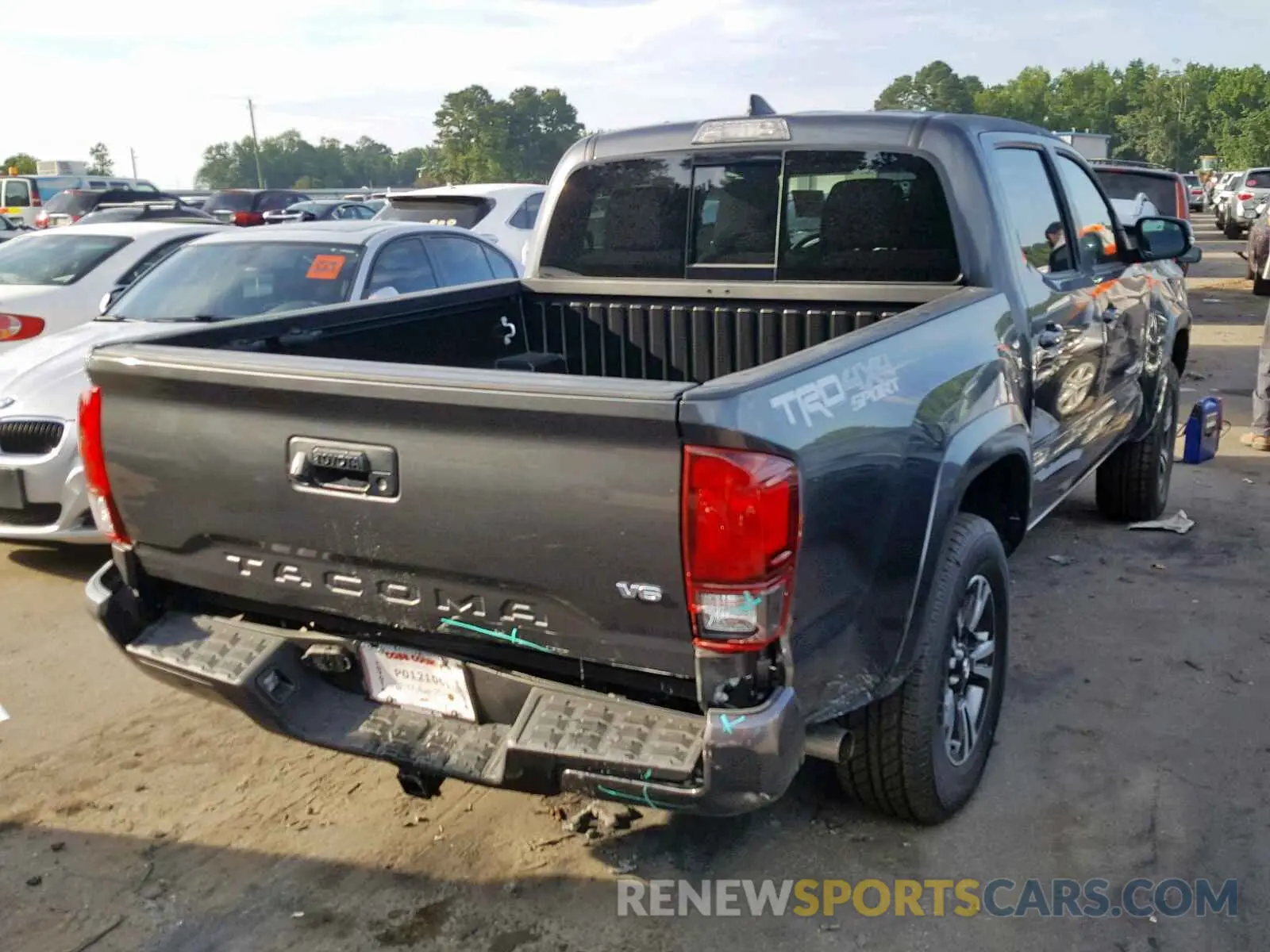 4 Photograph of a damaged car 3TMCZ5AN7KM257358 TOYOTA TACOMA 2019