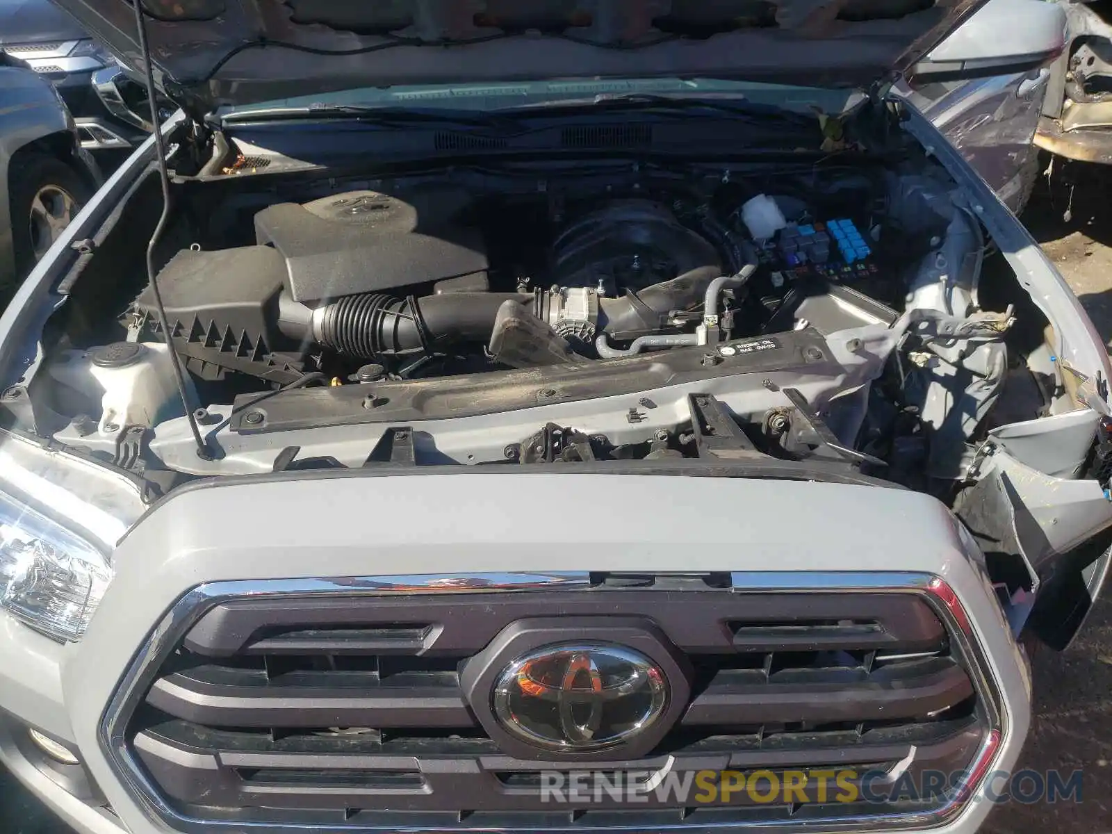 7 Photograph of a damaged car 3TMCZ5AN7KM263323 TOYOTA TACOMA 2019