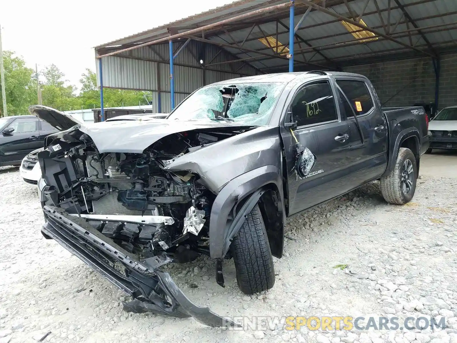 2 Photograph of a damaged car 3TMCZ5AN7KM267971 TOYOTA TACOMA 2019