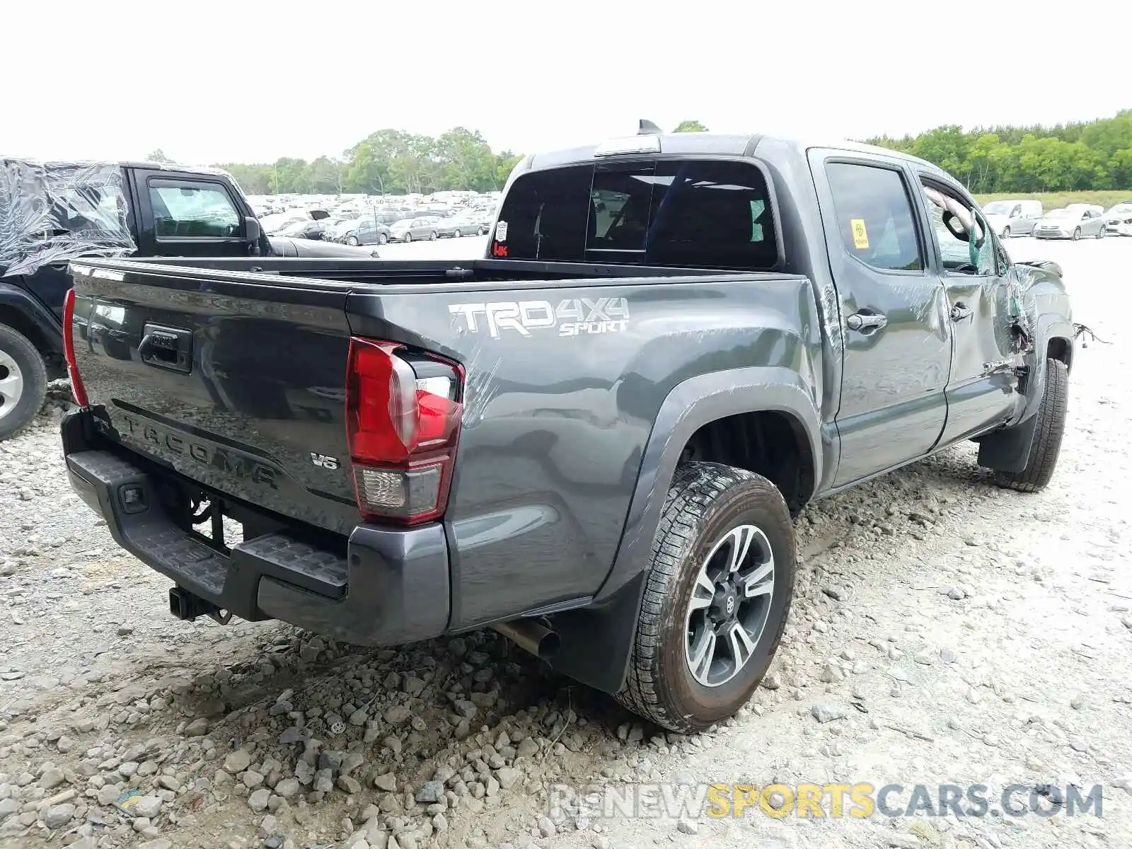 4 Photograph of a damaged car 3TMCZ5AN7KM267971 TOYOTA TACOMA 2019