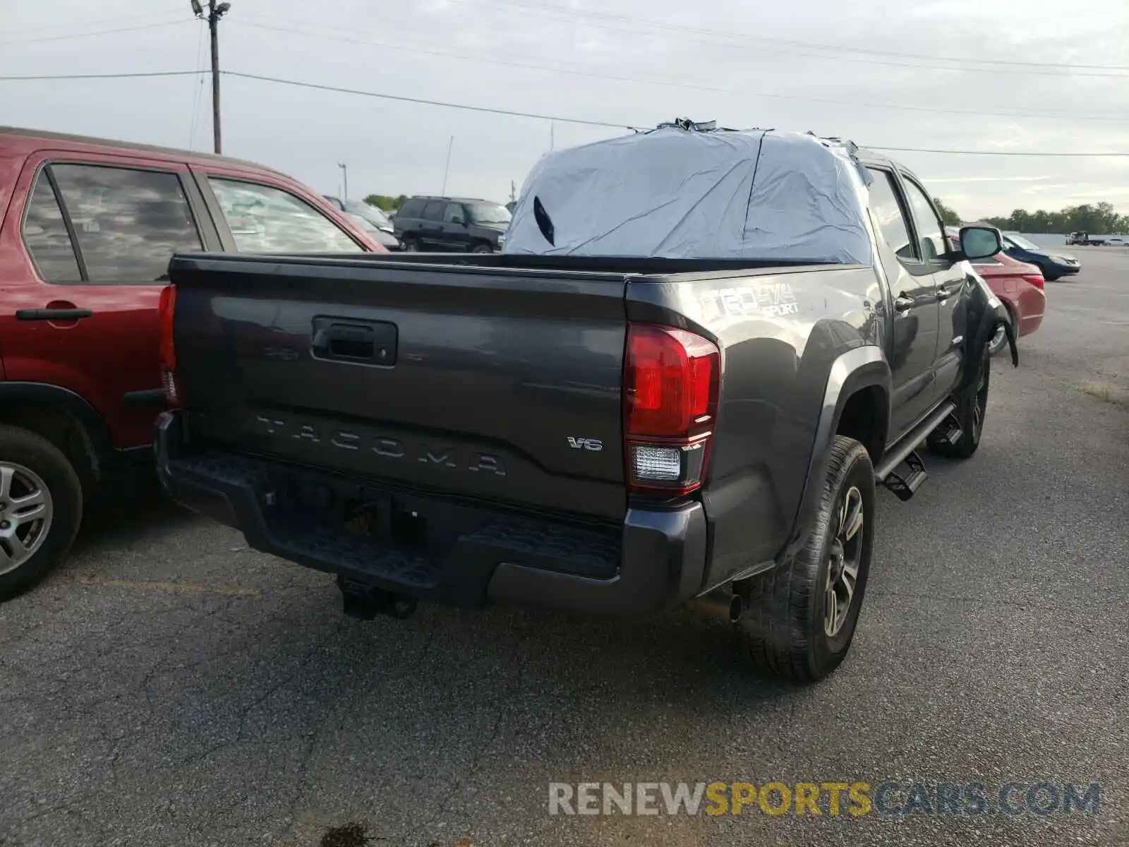 4 Photograph of a damaged car 3TMCZ5AN7KM279926 TOYOTA TACOMA 2019