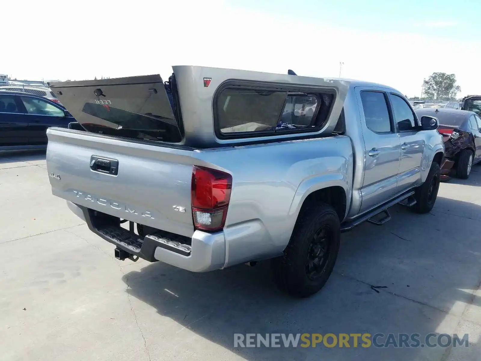 4 Photograph of a damaged car 3TMCZ5AN8KM191127 TOYOTA TACOMA 2019