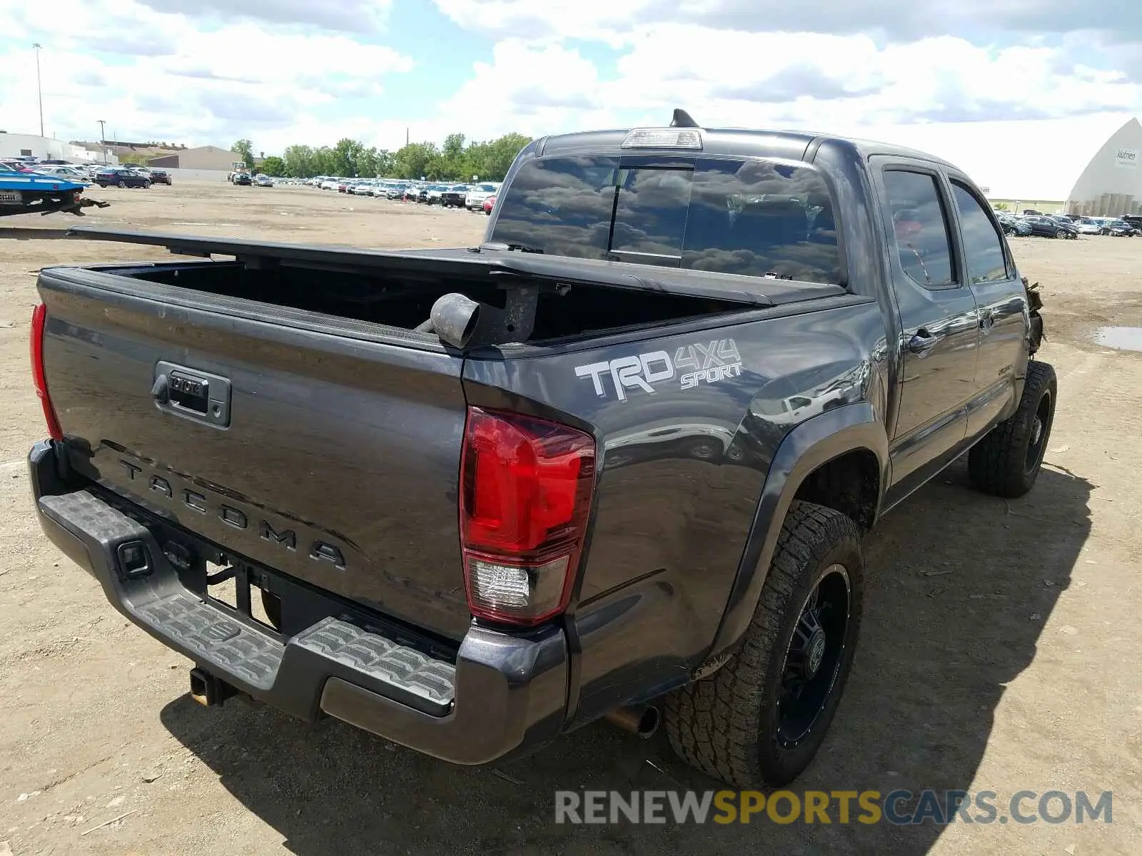 4 Photograph of a damaged car 3TMCZ5AN8KM197235 TOYOTA TACOMA 2019