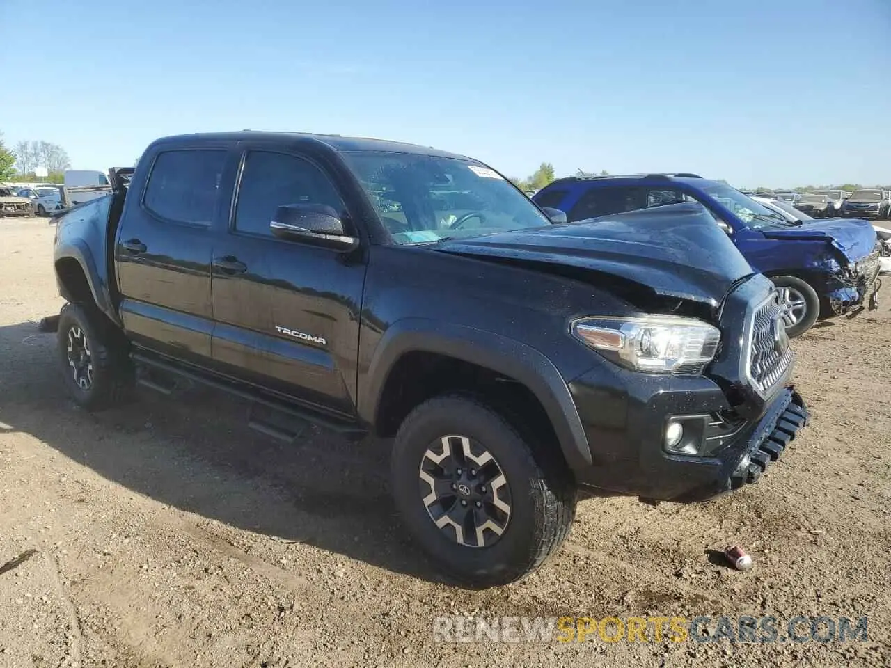4 Photograph of a damaged car 3TMCZ5AN8KM198319 TOYOTA TACOMA 2019