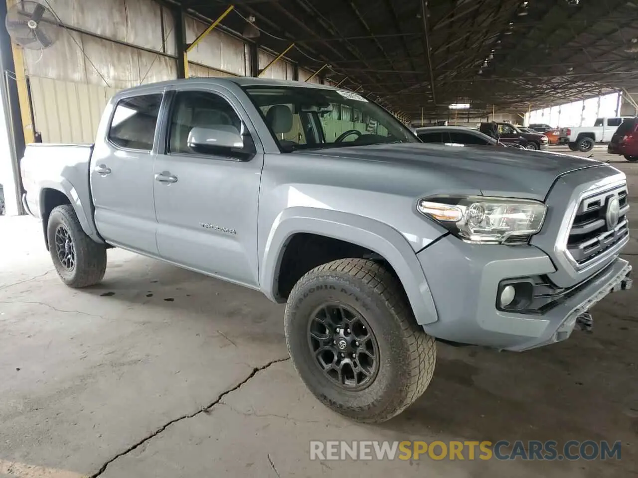 4 Photograph of a damaged car 3TMCZ5AN8KM245512 TOYOTA TACOMA 2019