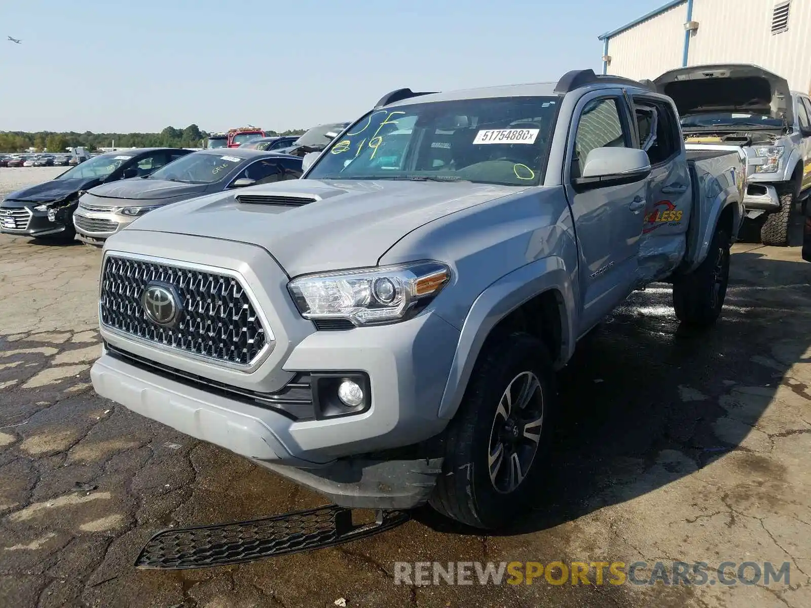 2 Photograph of a damaged car 3TMCZ5AN9KM199673 TOYOTA TACOMA 2019