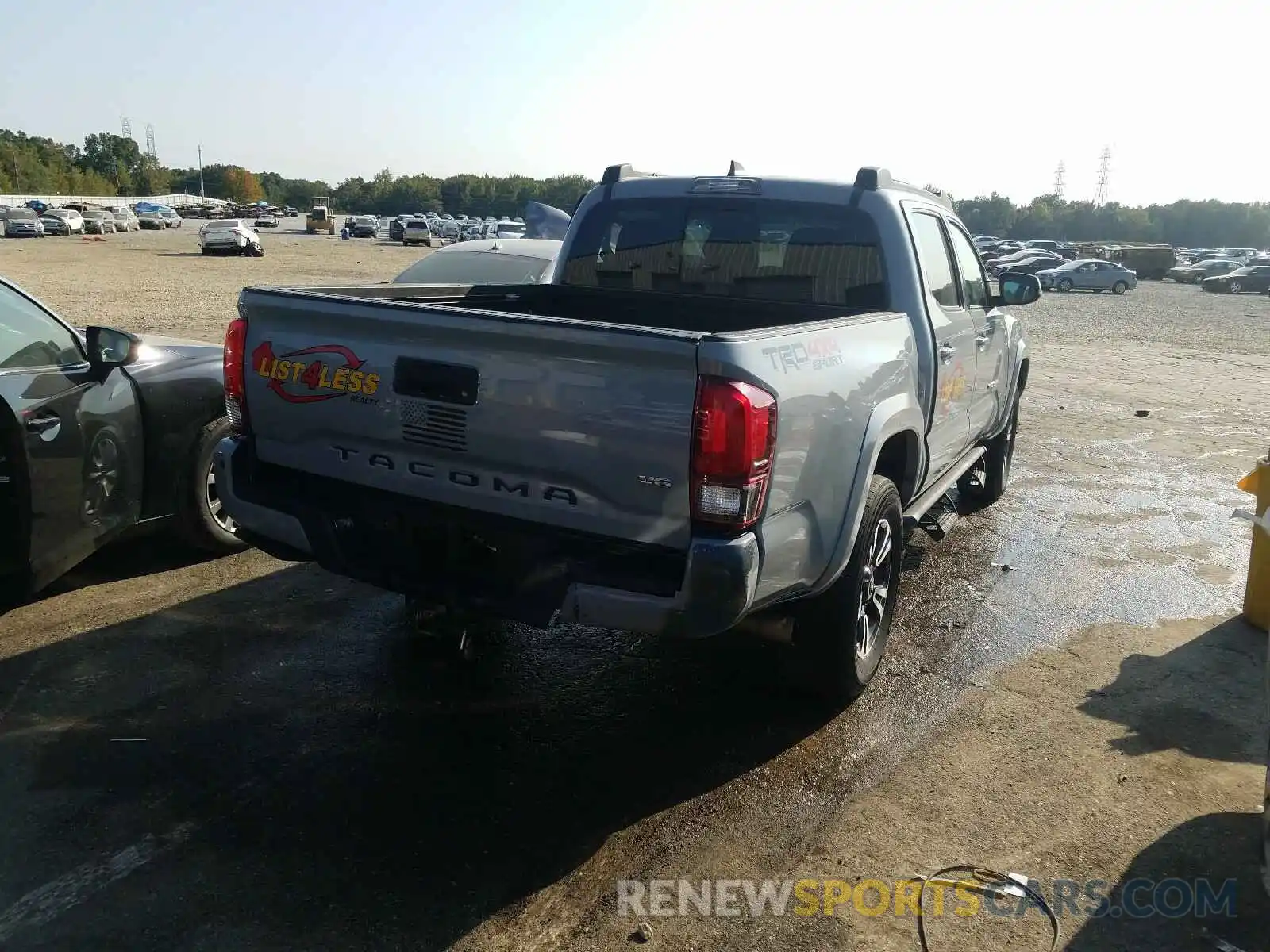 4 Photograph of a damaged car 3TMCZ5AN9KM199673 TOYOTA TACOMA 2019