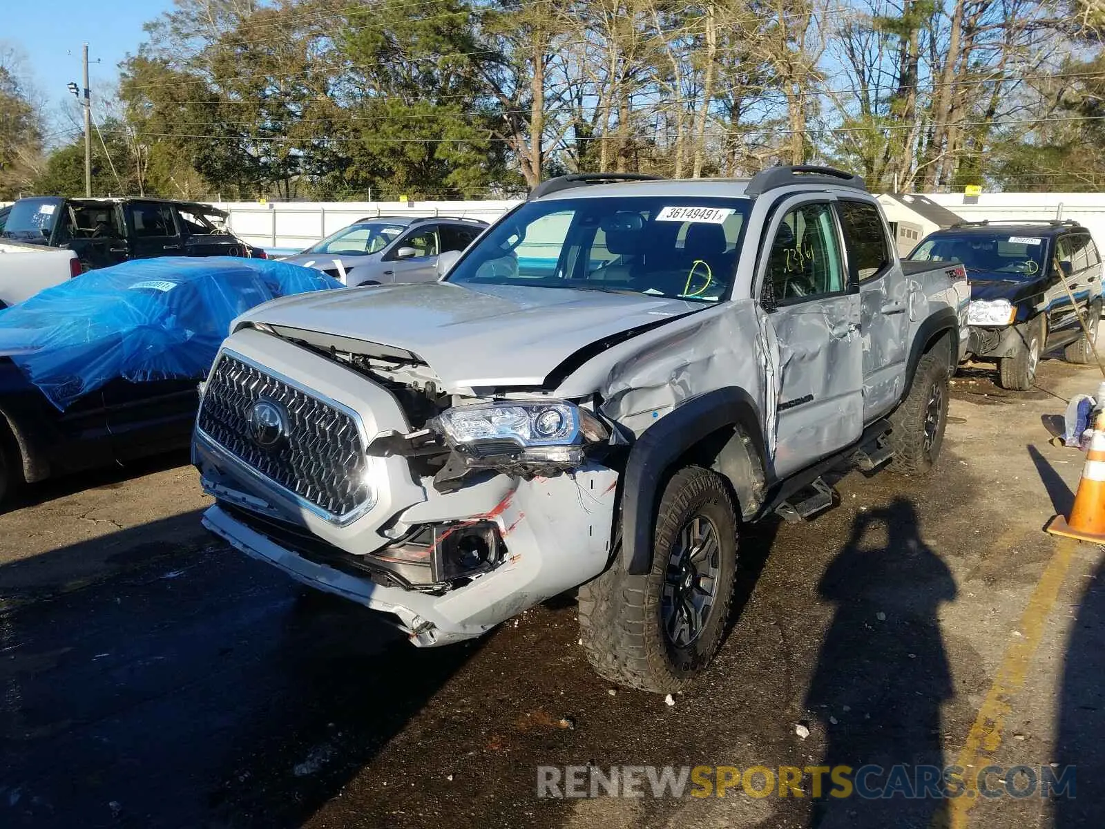 2 Photograph of a damaged car 3TMCZ5AN9KM205844 TOYOTA TACOMA 2019