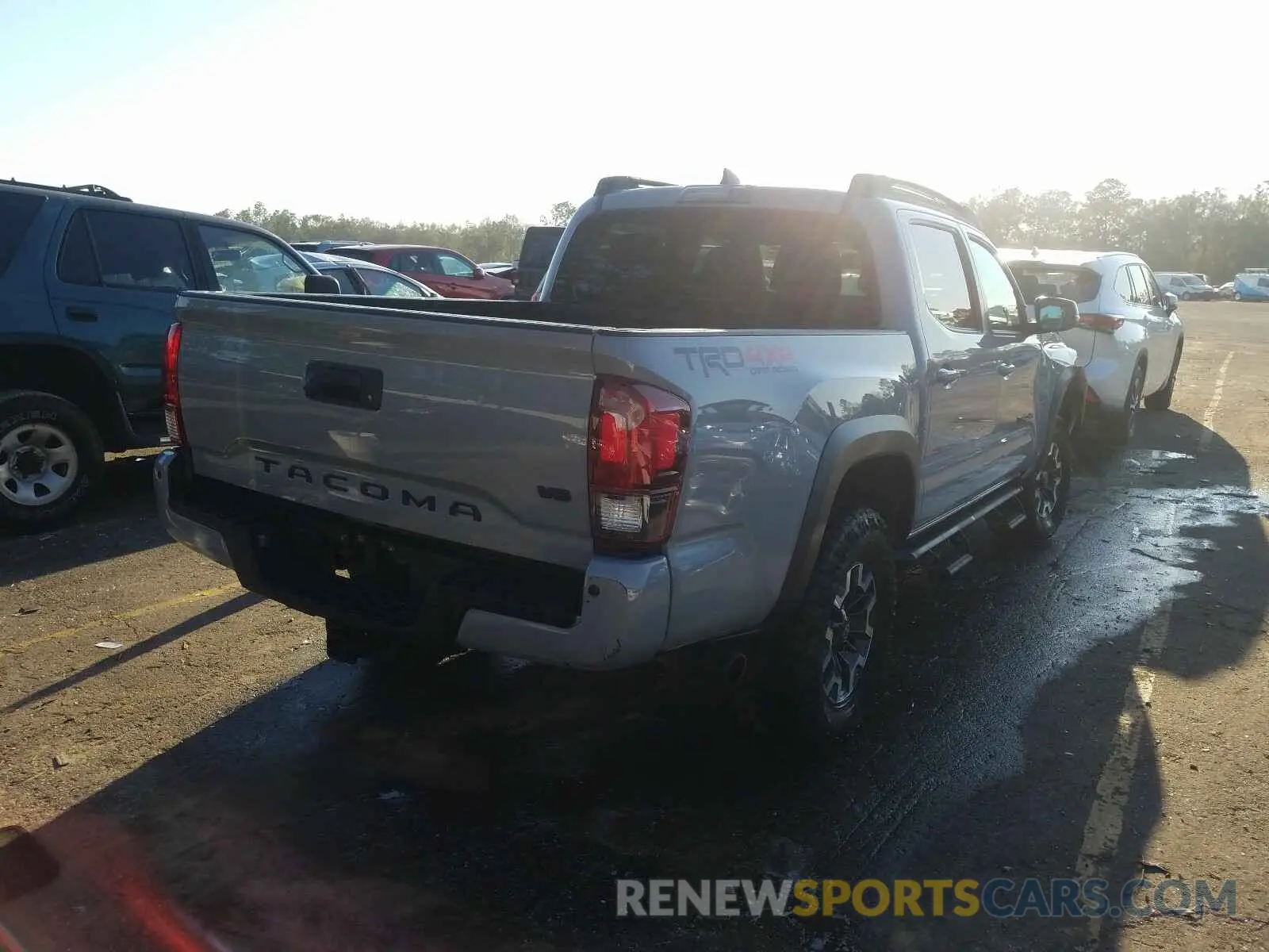 4 Photograph of a damaged car 3TMCZ5AN9KM205844 TOYOTA TACOMA 2019