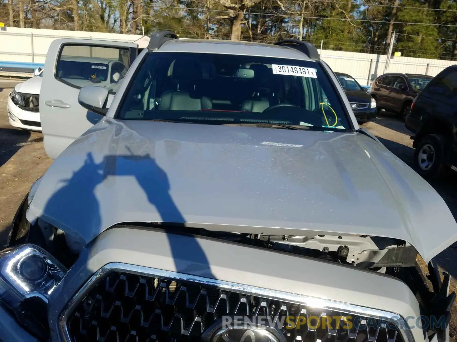 7 Photograph of a damaged car 3TMCZ5AN9KM205844 TOYOTA TACOMA 2019