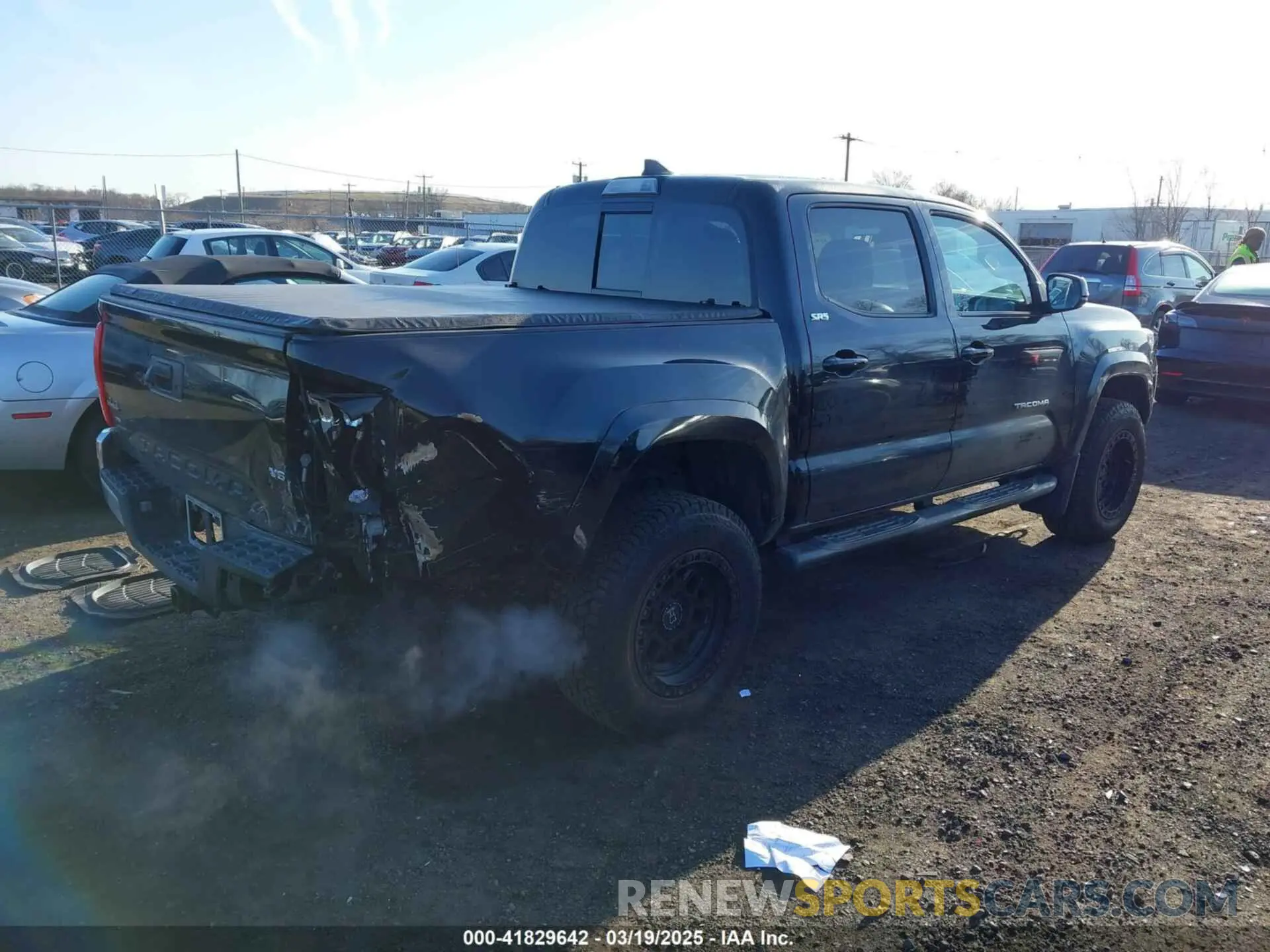 4 Photograph of a damaged car 3TMCZ5AN9KM228461 TOYOTA TACOMA 2019