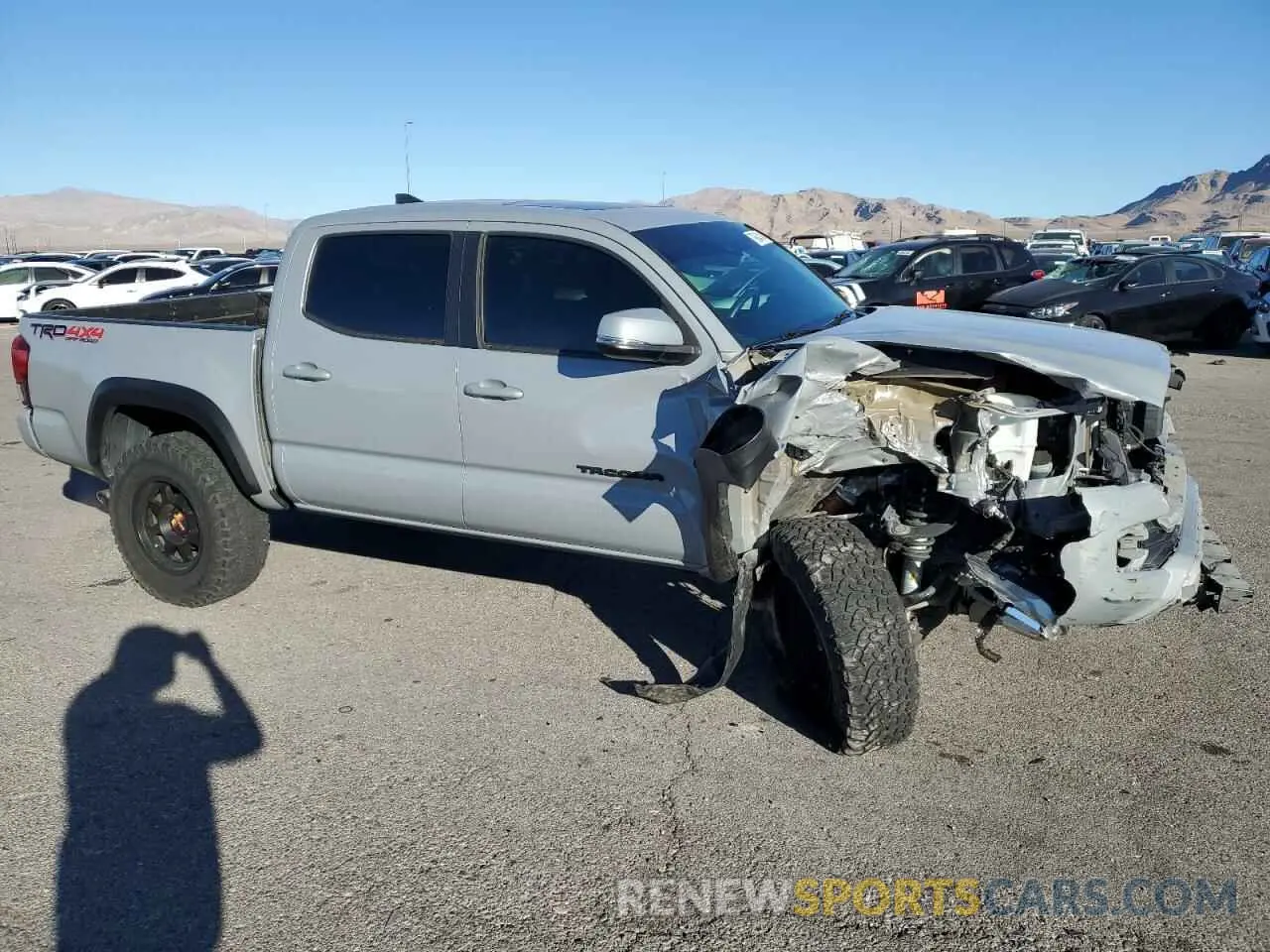 4 Photograph of a damaged car 3TMCZ5AN9KM232784 TOYOTA TACOMA 2019