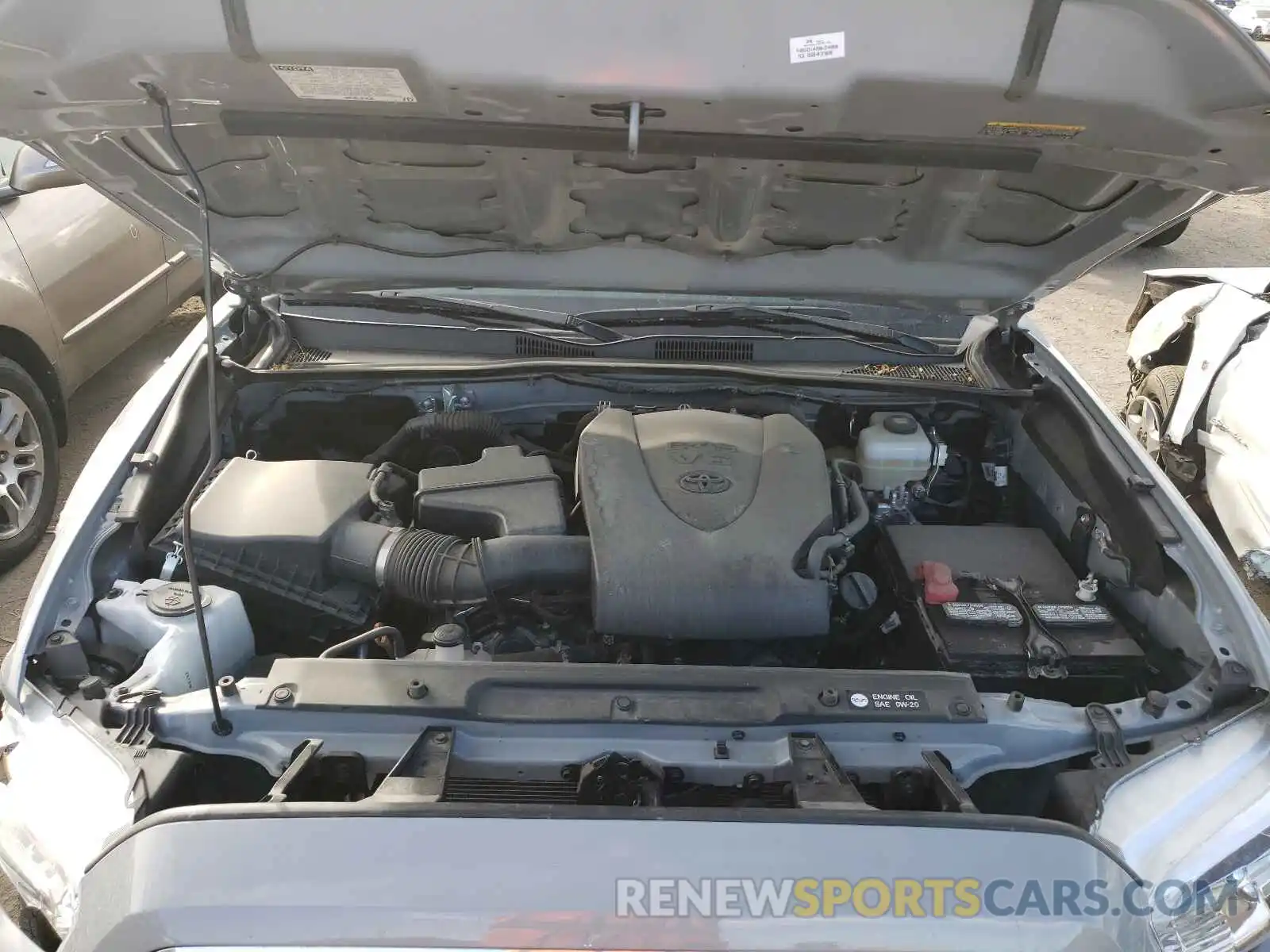 7 Photograph of a damaged car 3TMCZ5AN9KM243705 TOYOTA TACOMA 2019