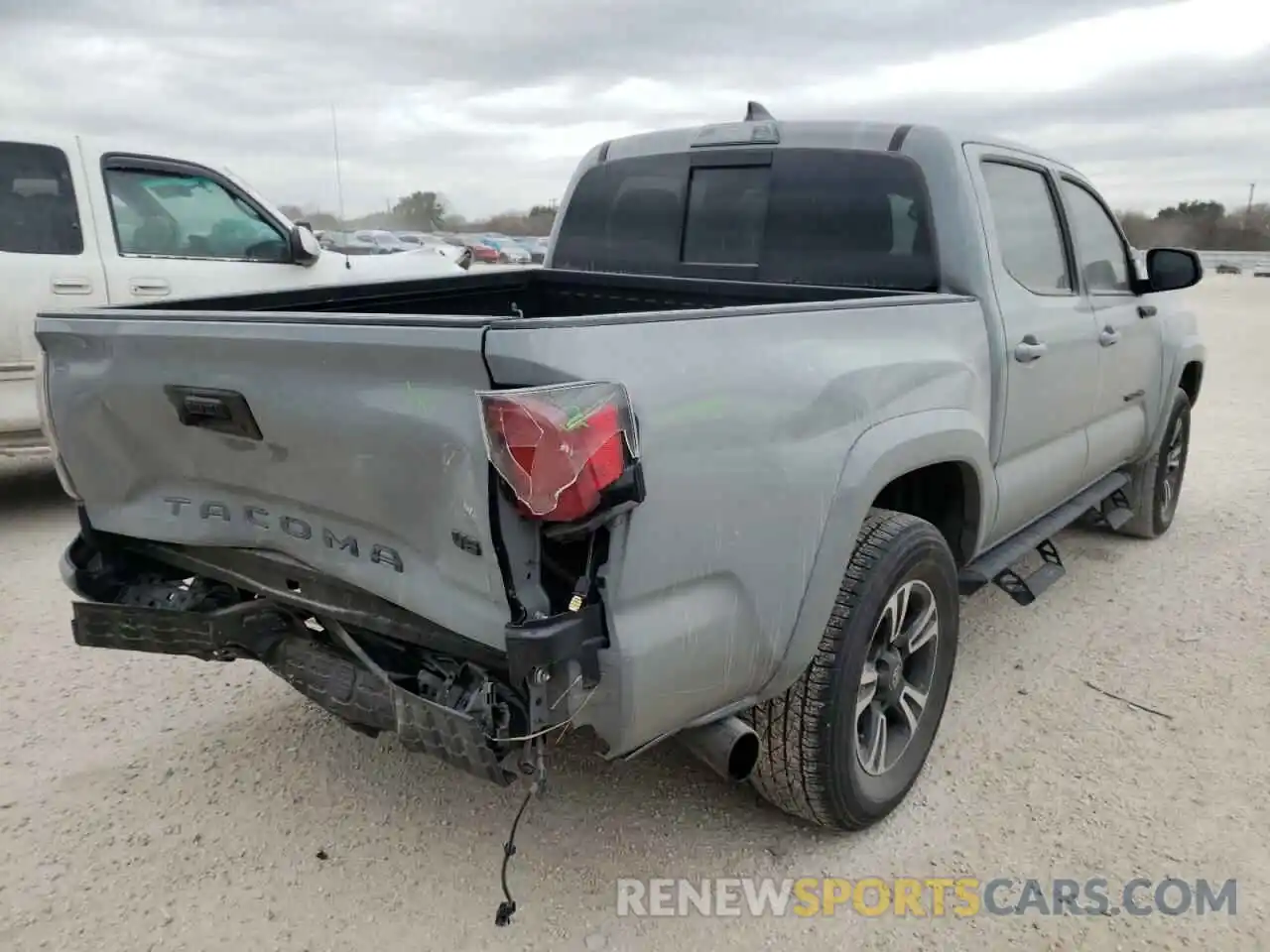 4 Photograph of a damaged car 3TMCZ5AN9KM261752 TOYOTA TACOMA 2019