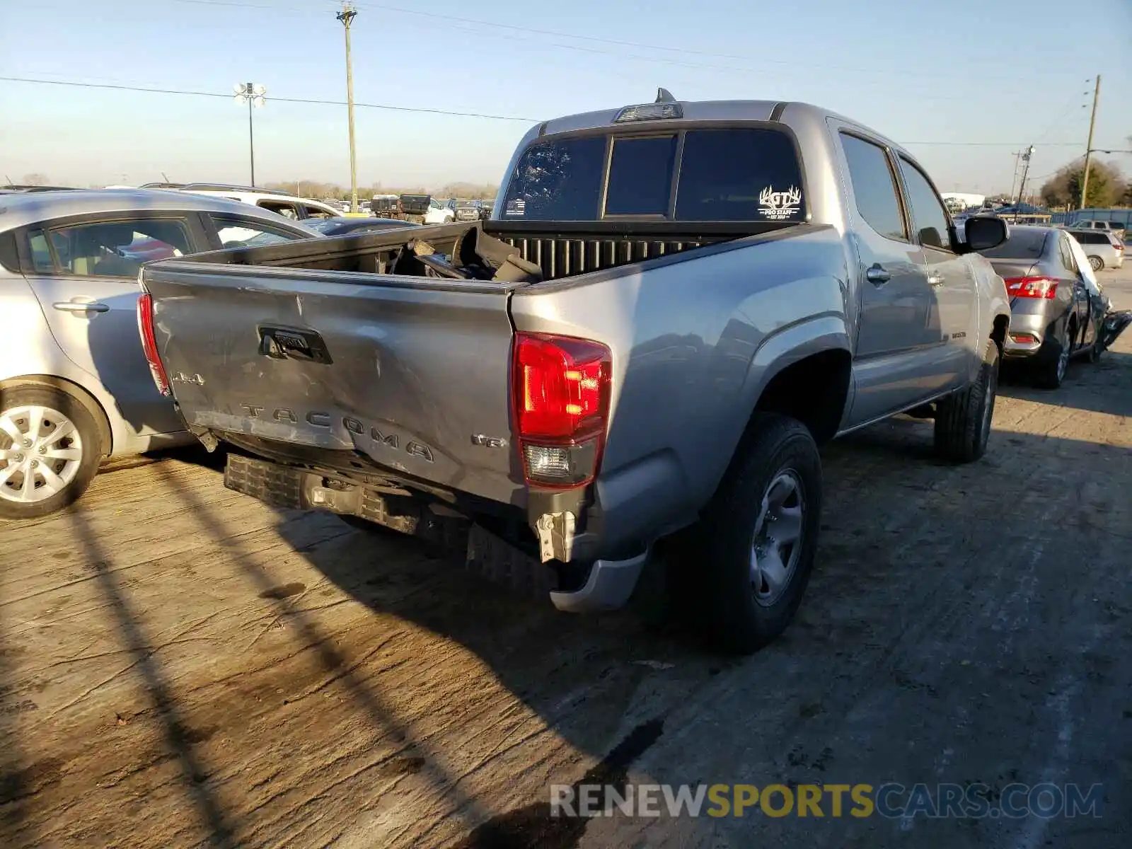 4 Photograph of a damaged car 3TMCZ5AN9KM262979 TOYOTA TACOMA 2019