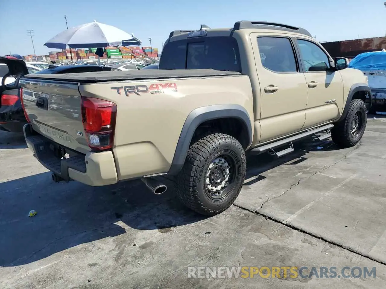 3 Photograph of a damaged car 3TMCZ5AN9KM273397 TOYOTA TACOMA 2019