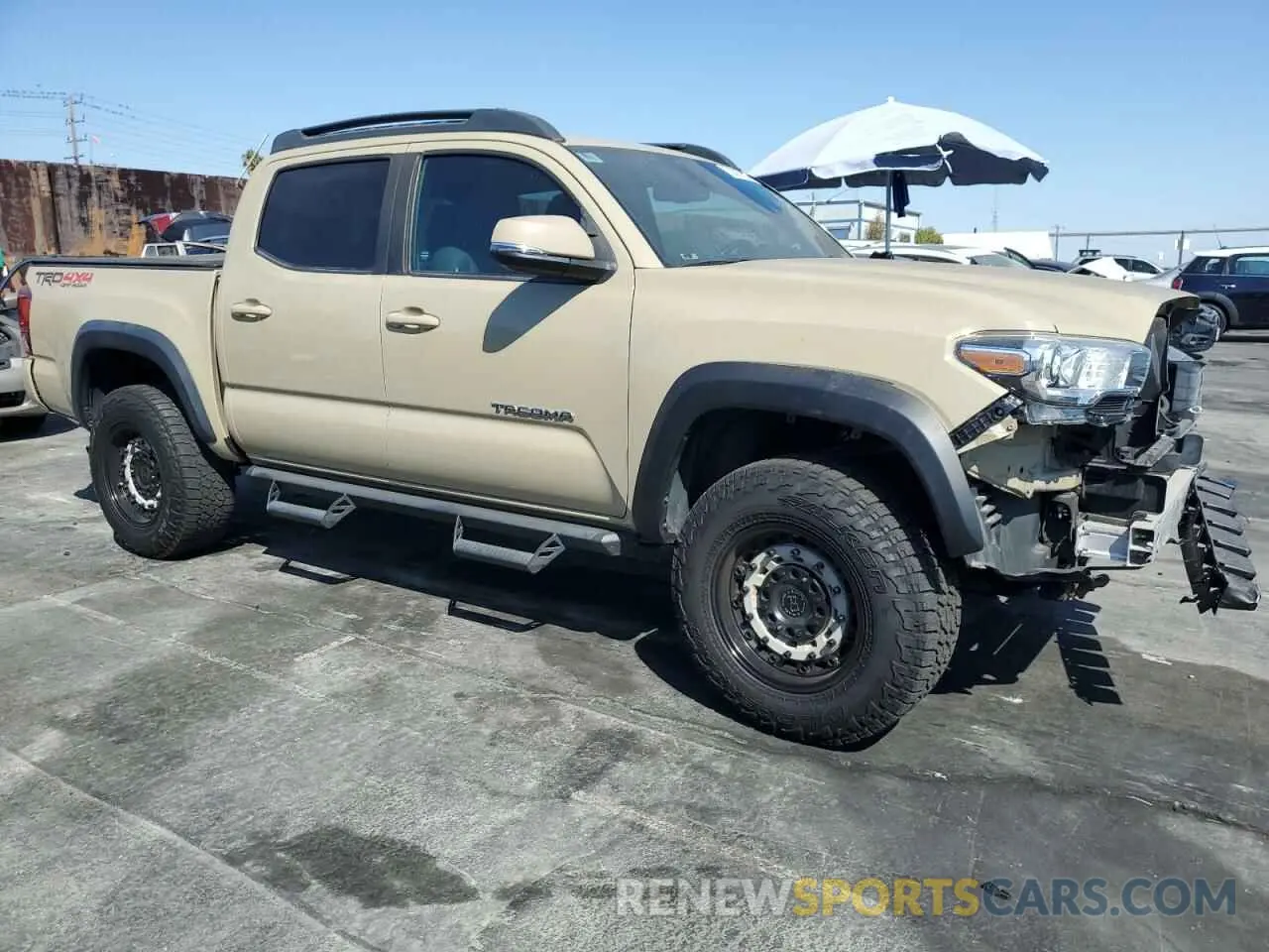 4 Photograph of a damaged car 3TMCZ5AN9KM273397 TOYOTA TACOMA 2019