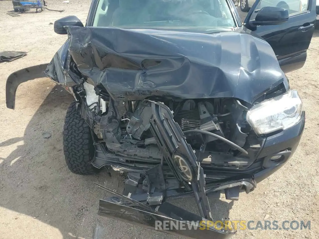 11 Photograph of a damaged car 3TMCZ5AN9KM283203 TOYOTA TACOMA 2019