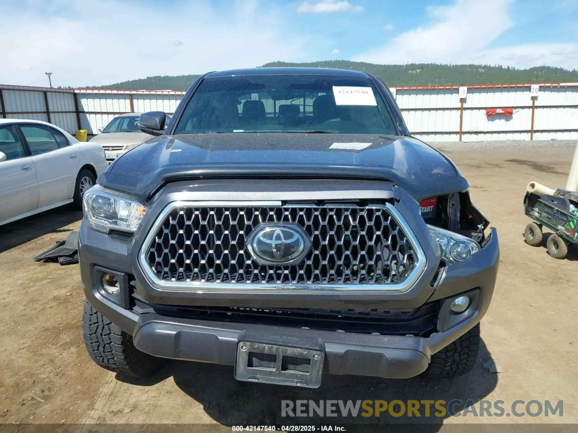 12 Photograph of a damaged car 3TMCZ5ANXKM191842 TOYOTA TACOMA 2019