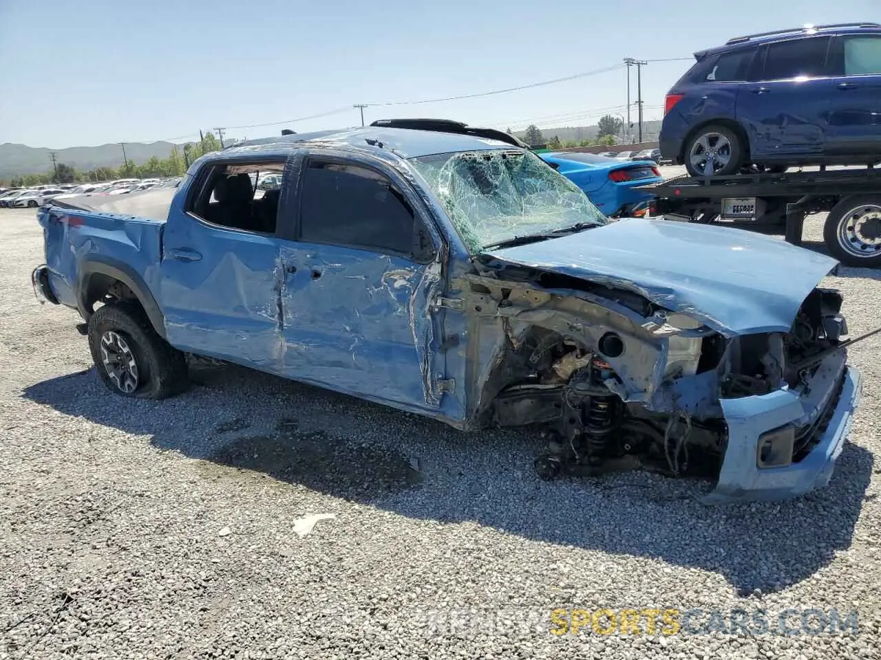 4 Photograph of a damaged car 3TMCZ5ANXKM195597 TOYOTA TACOMA 2019