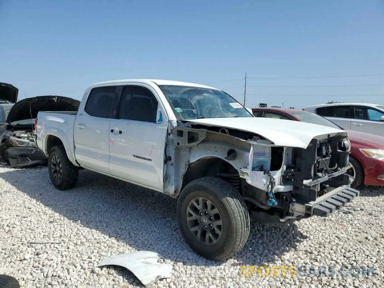4 Photograph of a damaged car 3TMCZ5ANXKM226685 TOYOTA TACOMA 2019