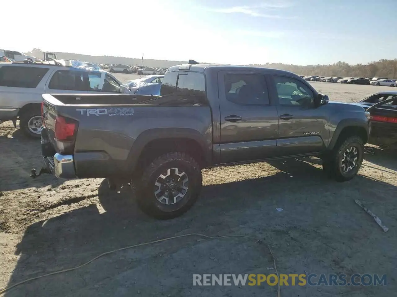 3 Photograph of a damaged car 3TMCZ5ANXKM232275 TOYOTA TACOMA 2019