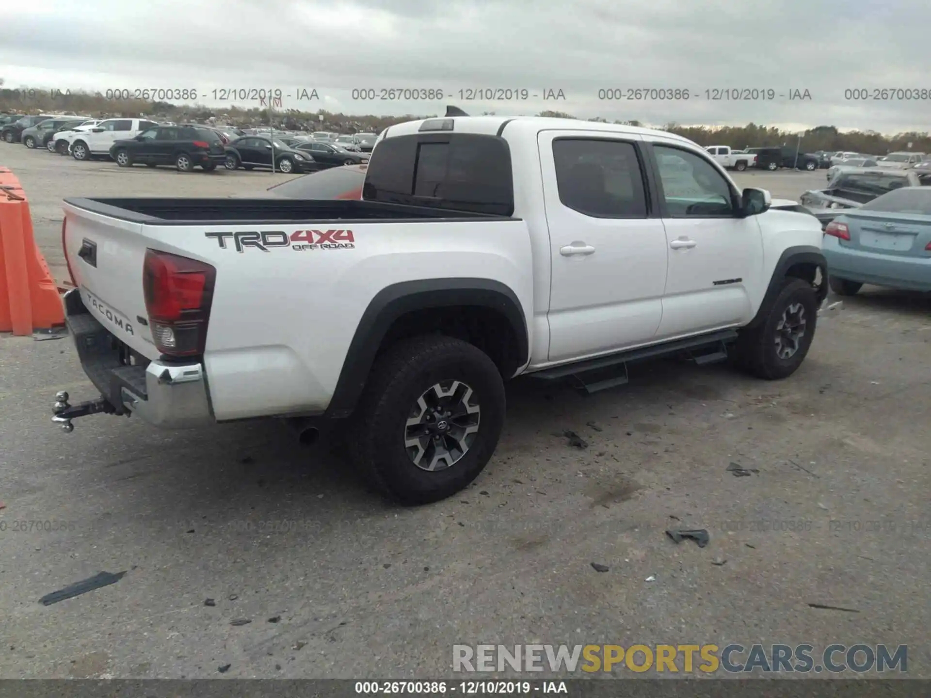 4 Photograph of a damaged car 3TMCZ5ANXKM243647 TOYOTA TACOMA 2019