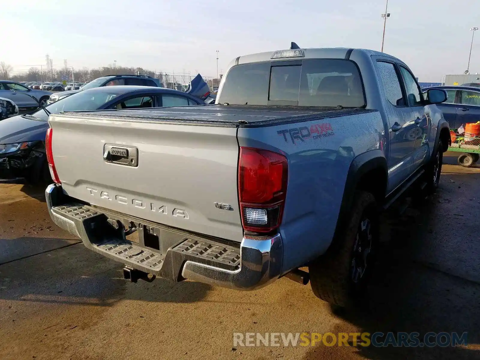 4 Photograph of a damaged car 3TMCZ5ANXKM247486 TOYOTA TACOMA 2019