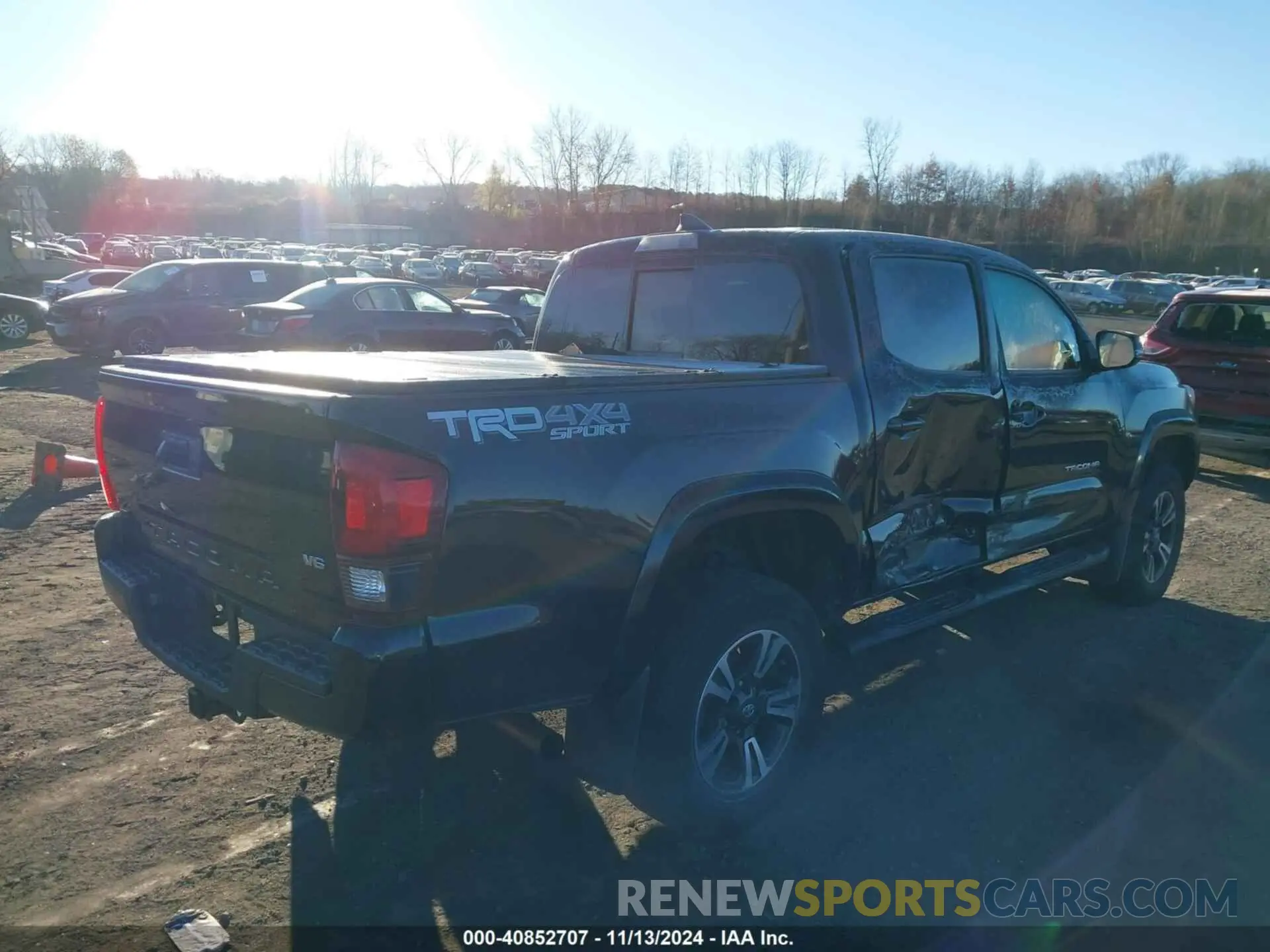 4 Photograph of a damaged car 3TMCZ5ANXKM266975 TOYOTA TACOMA 2019