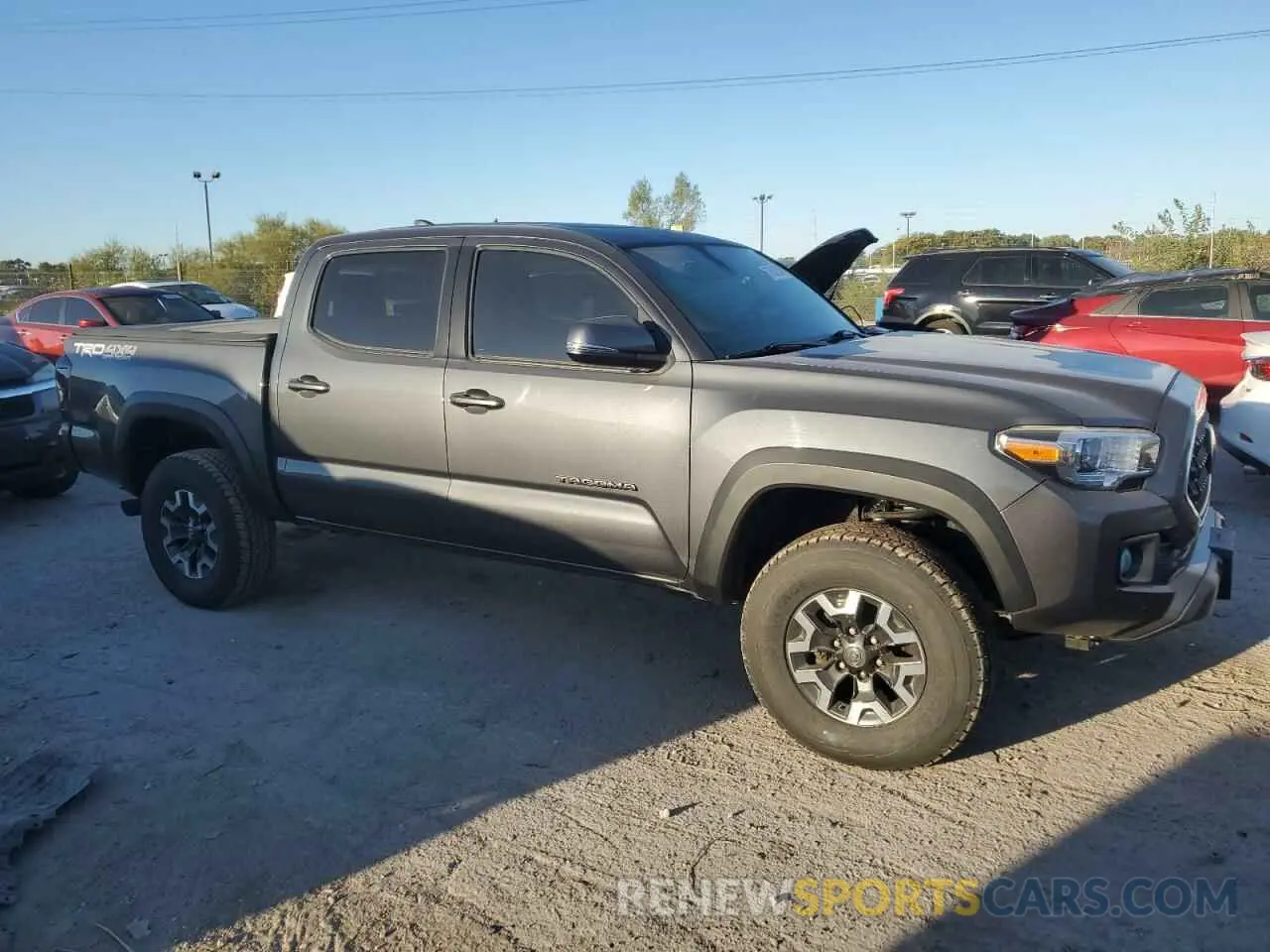 4 Photograph of a damaged car 3TMCZ5ANXKM279791 TOYOTA TACOMA 2019