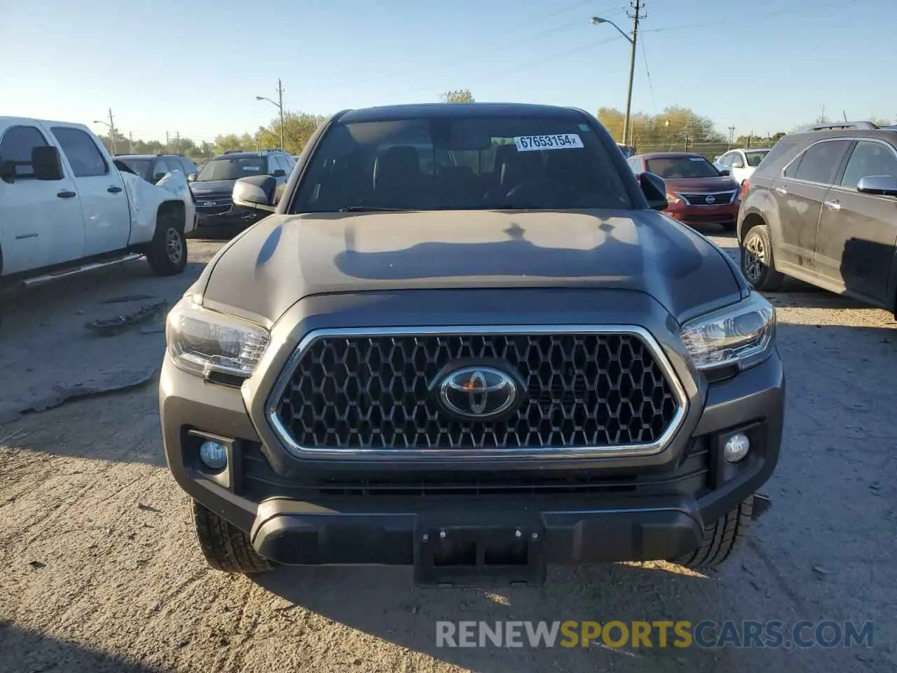 5 Photograph of a damaged car 3TMCZ5ANXKM279791 TOYOTA TACOMA 2019