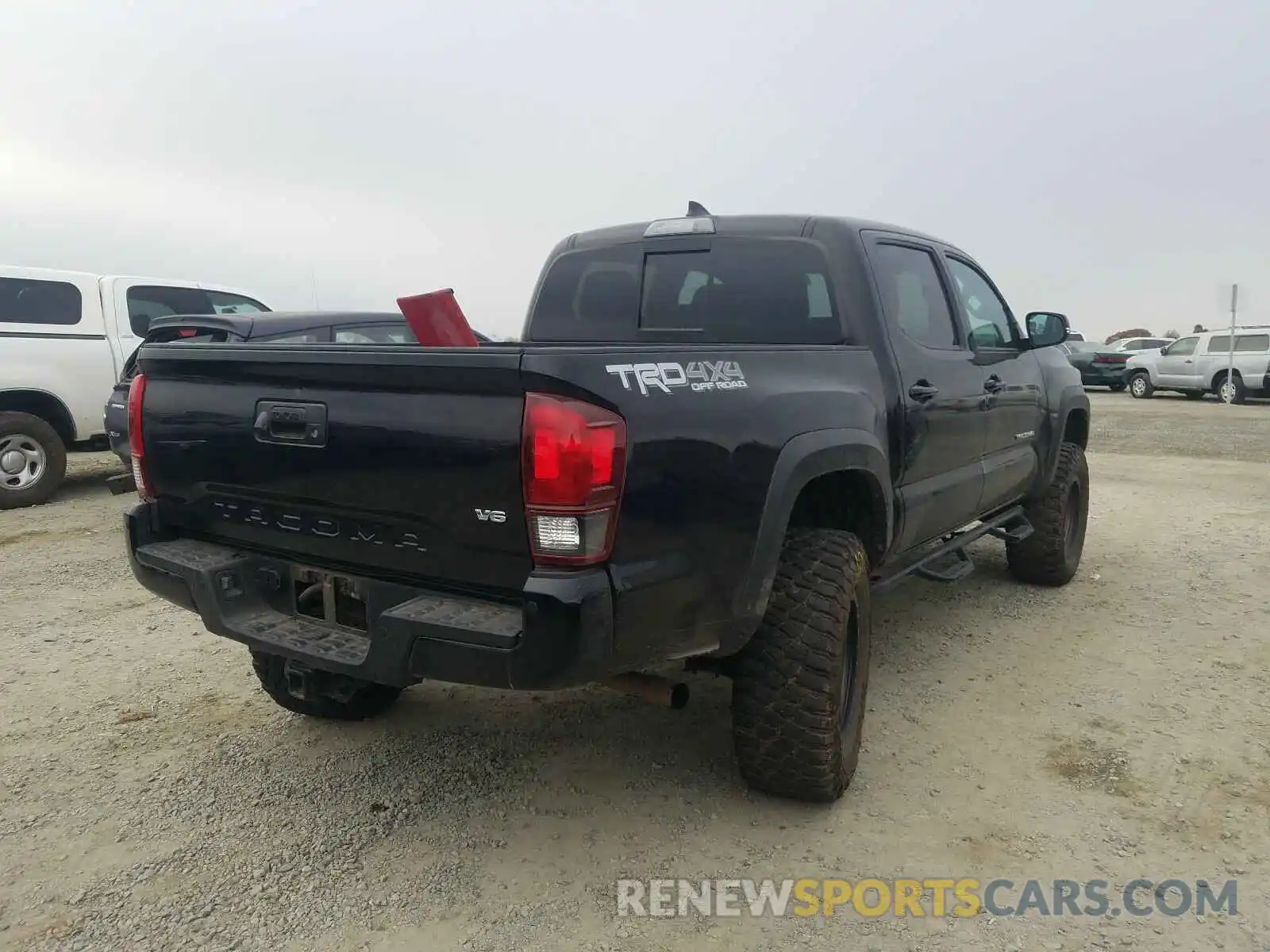 4 Photograph of a damaged car 3TMCZ5ANXKM282268 TOYOTA TACOMA 2019