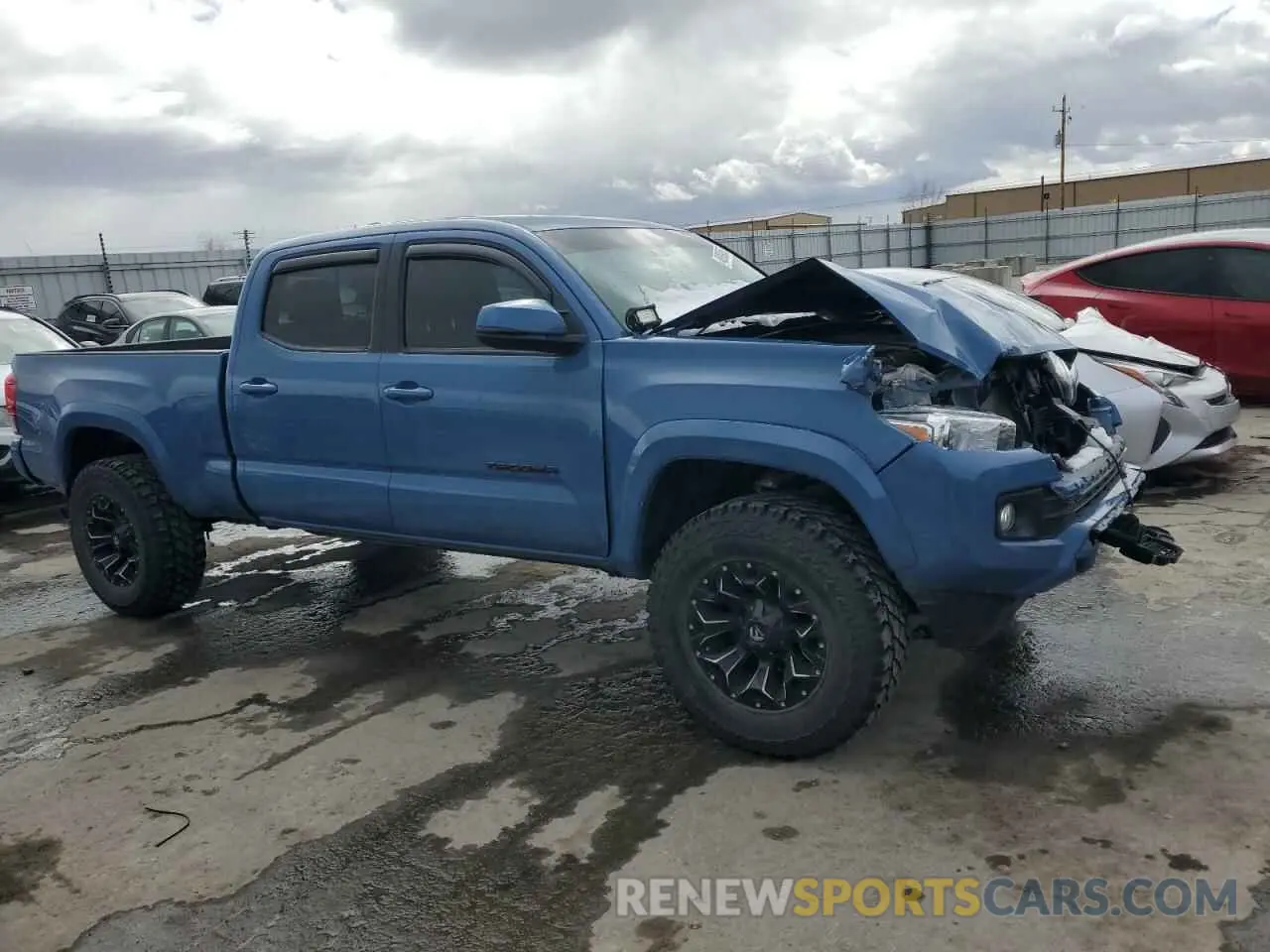 4 Photograph of a damaged car 3TMDZ5BN2KM056907 TOYOTA TACOMA 2019