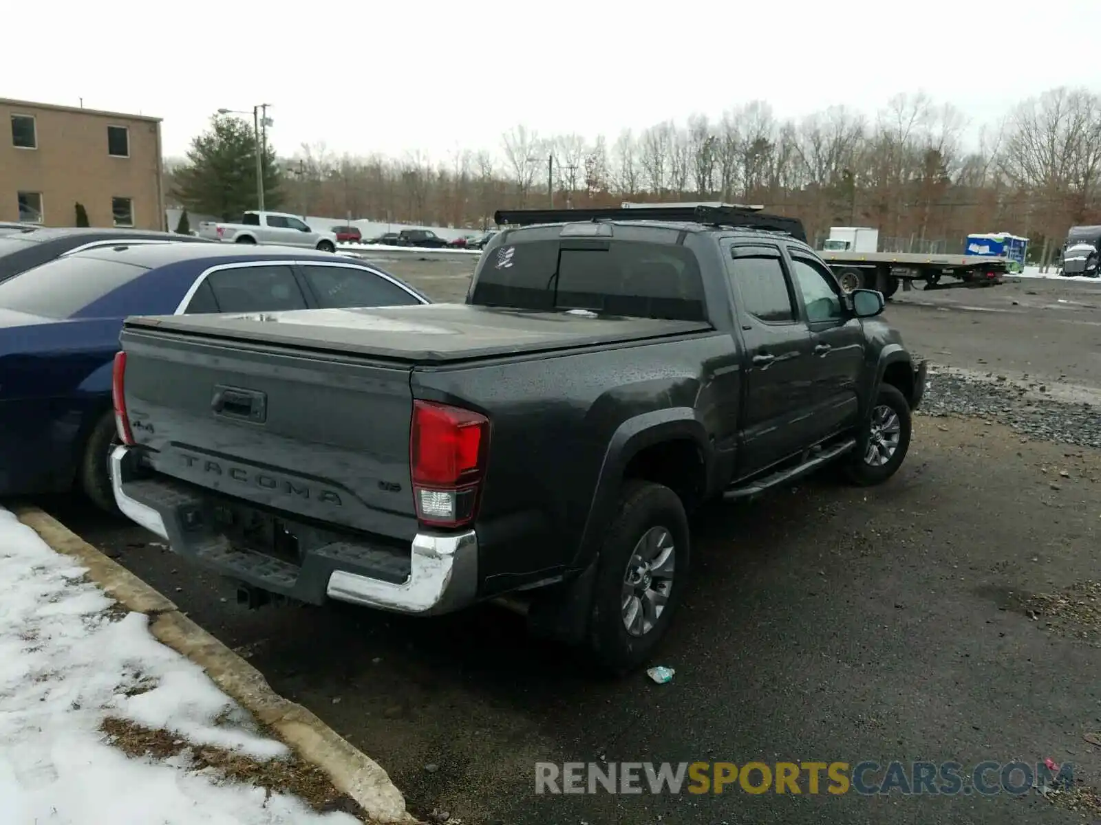 4 Photograph of a damaged car 3TMDZ5BN2KM058799 TOYOTA TACOMA 2019