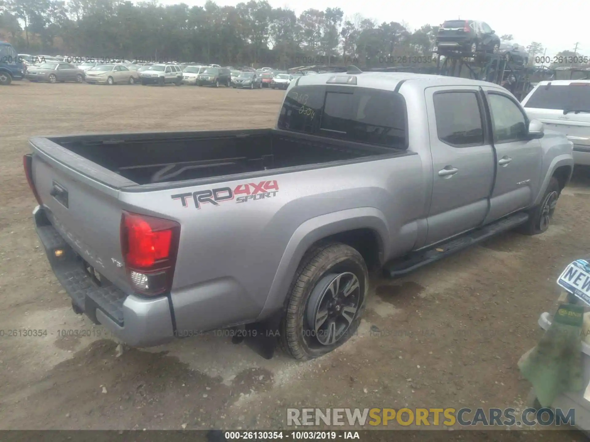 4 Photograph of a damaged car 3TMDZ5BN3KM058987 TOYOTA TACOMA 2019