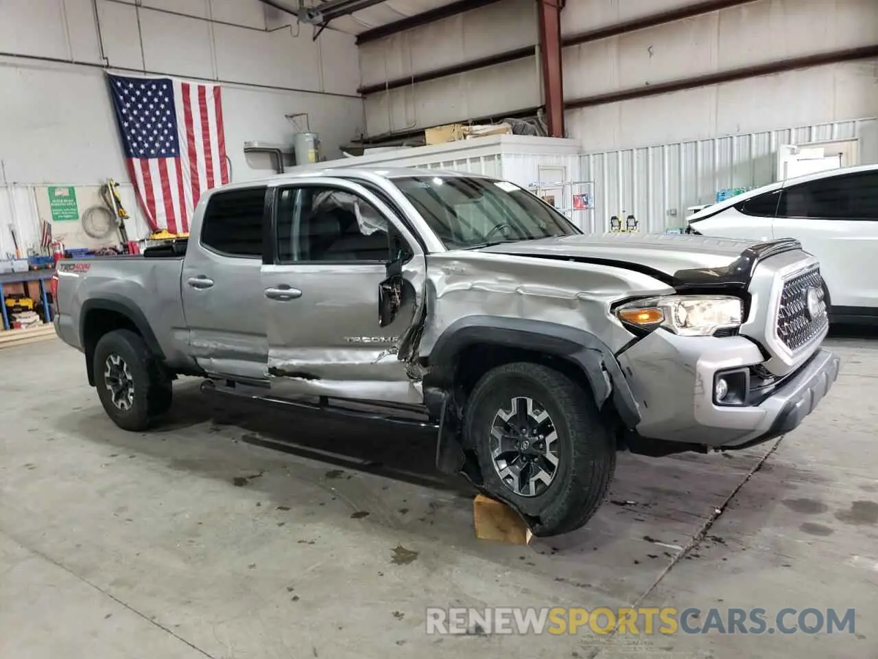 4 Photograph of a damaged car 3TMDZ5BN3KM062134 TOYOTA TACOMA 2019