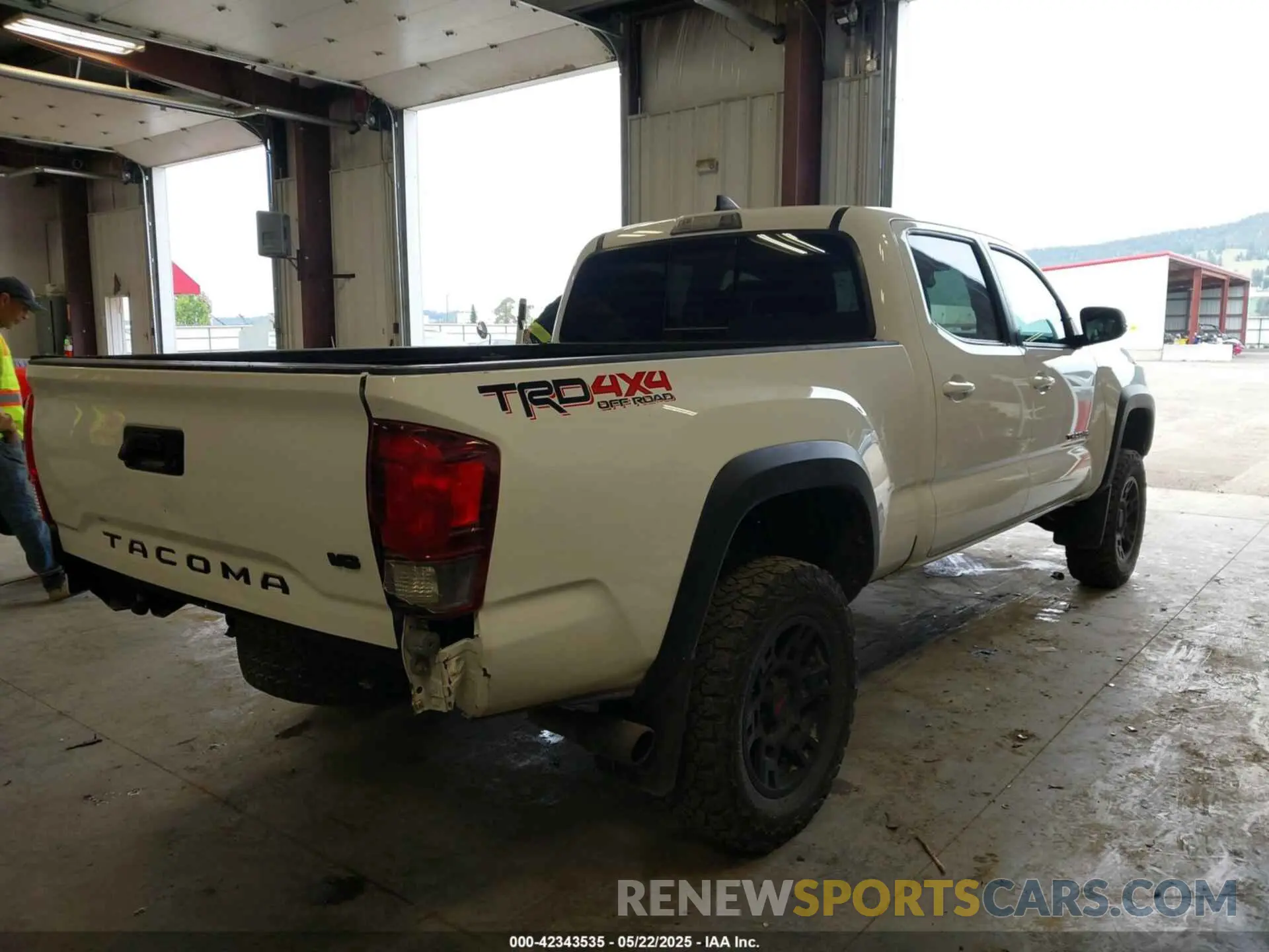 4 Photograph of a damaged car 3TMDZ5BN3KM071352 TOYOTA TACOMA 2019