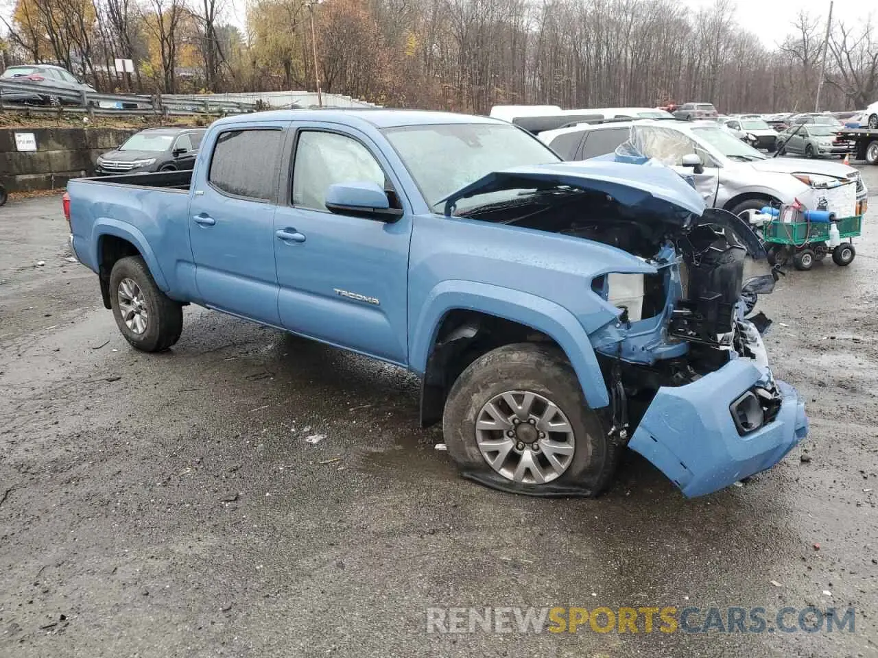 4 Photograph of a damaged car 3TMDZ5BN4KM060442 TOYOTA TACOMA 2019