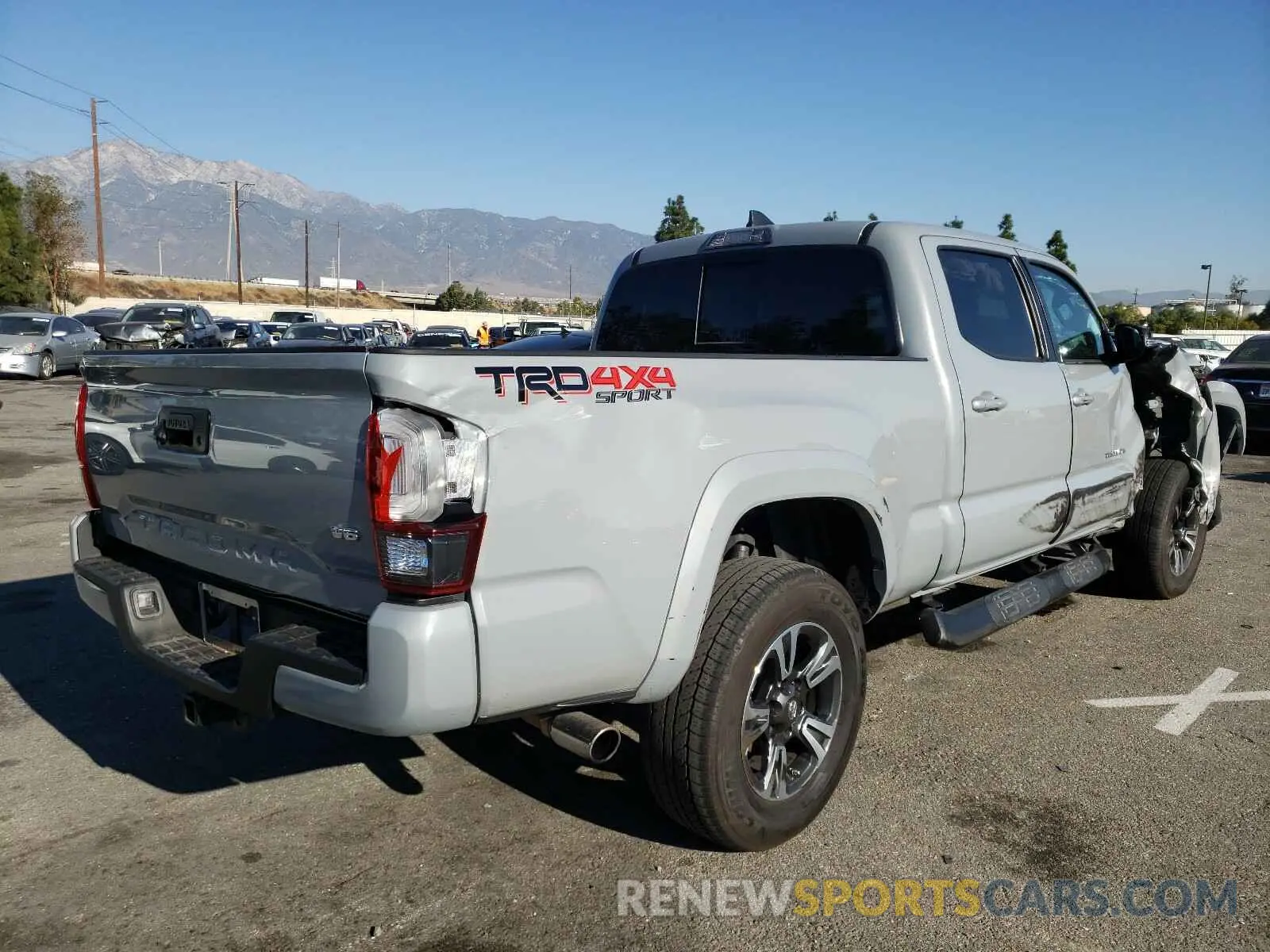 4 Photograph of a damaged car 3TMDZ5BN4KM065348 TOYOTA TACOMA 2019