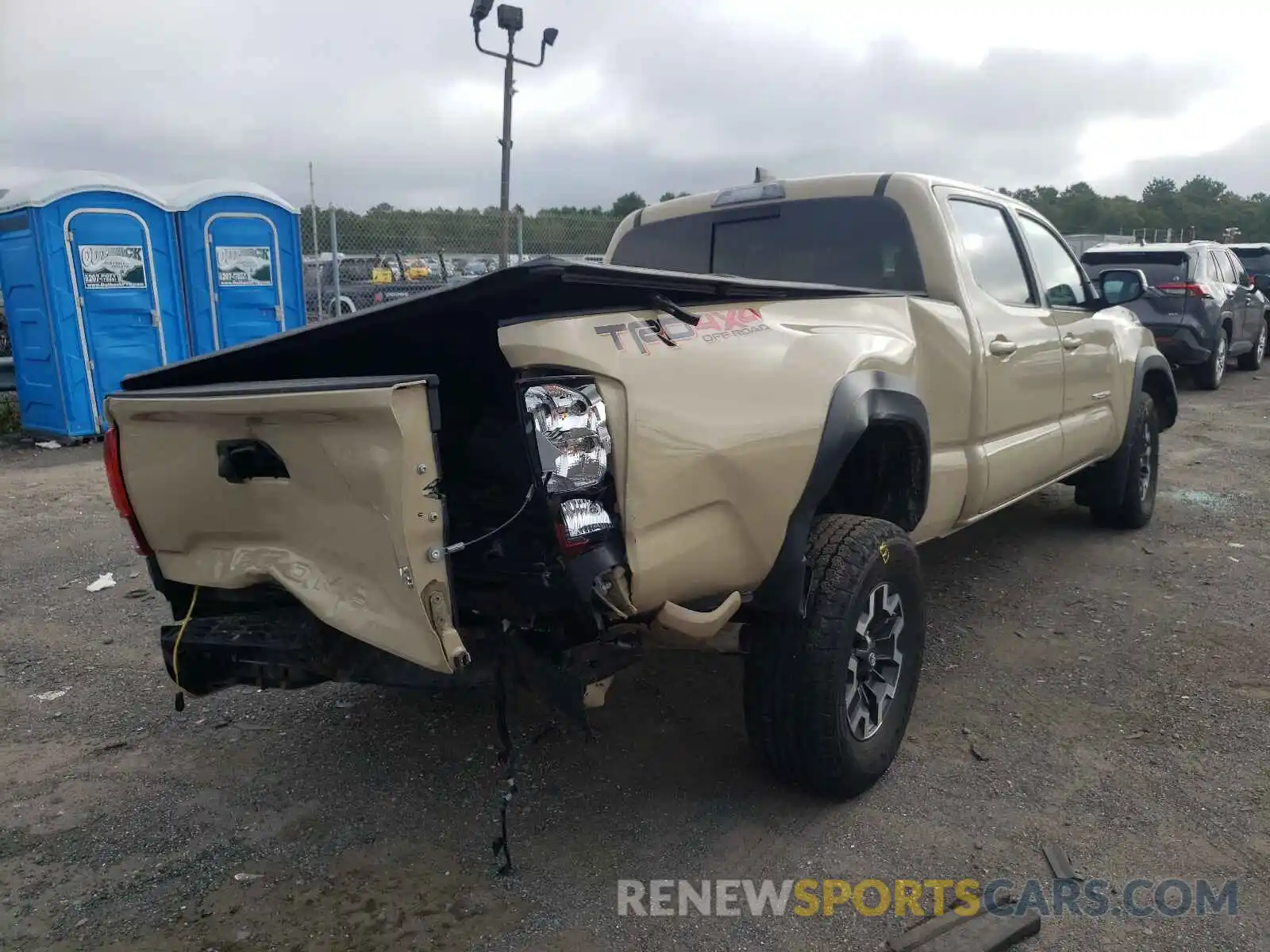 4 Photograph of a damaged car 3TMDZ5BN5KM058117 TOYOTA TACOMA 2019