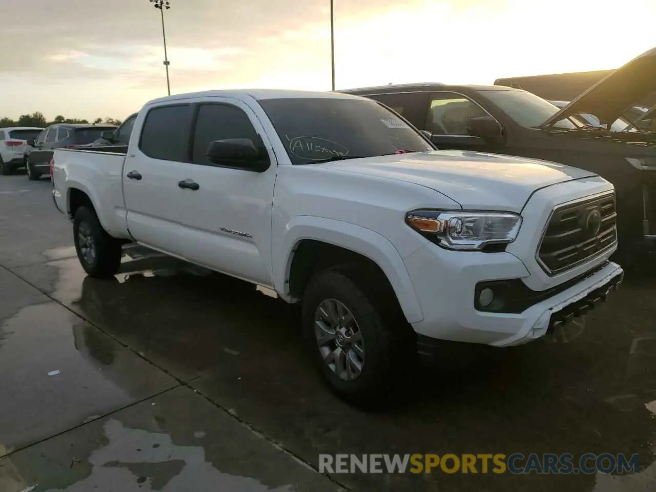 4 Photograph of a damaged car 3TMDZ5BN5KM059266 TOYOTA TACOMA 2019