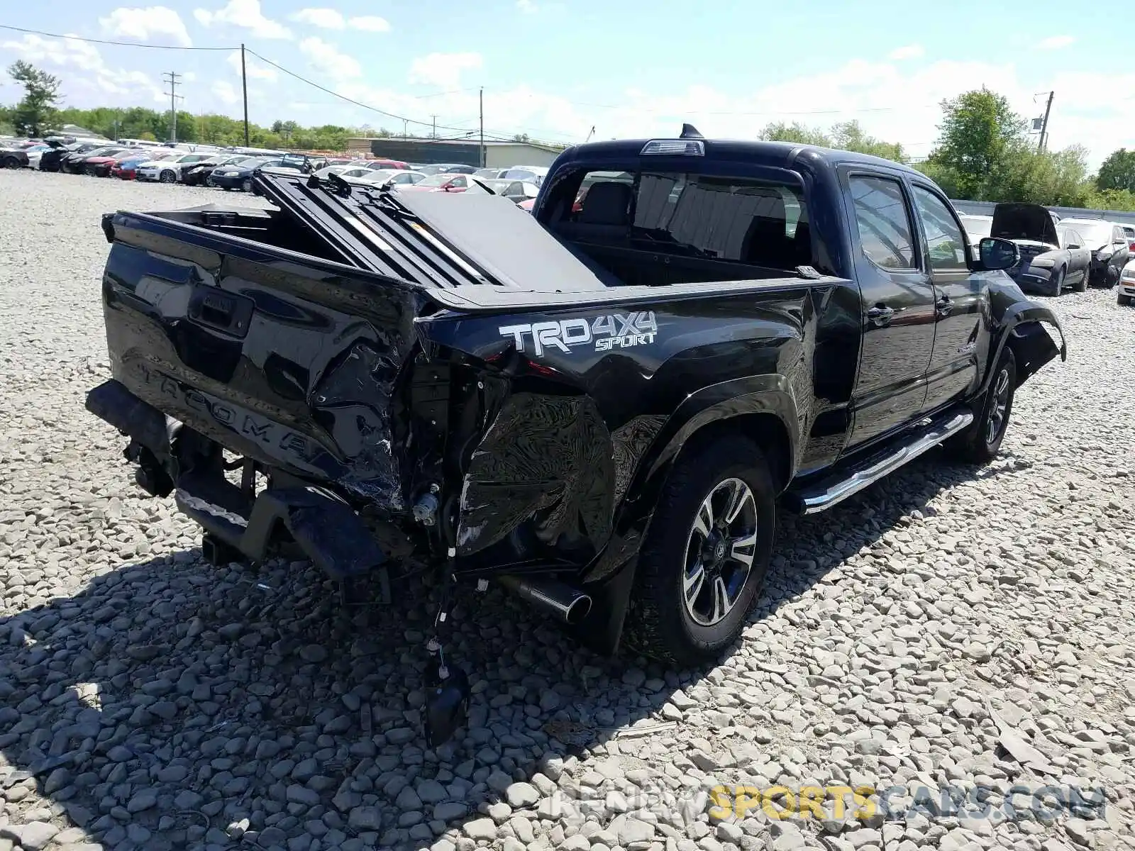 4 Photograph of a damaged car 3TMDZ5BN5KM061289 TOYOTA TACOMA 2019