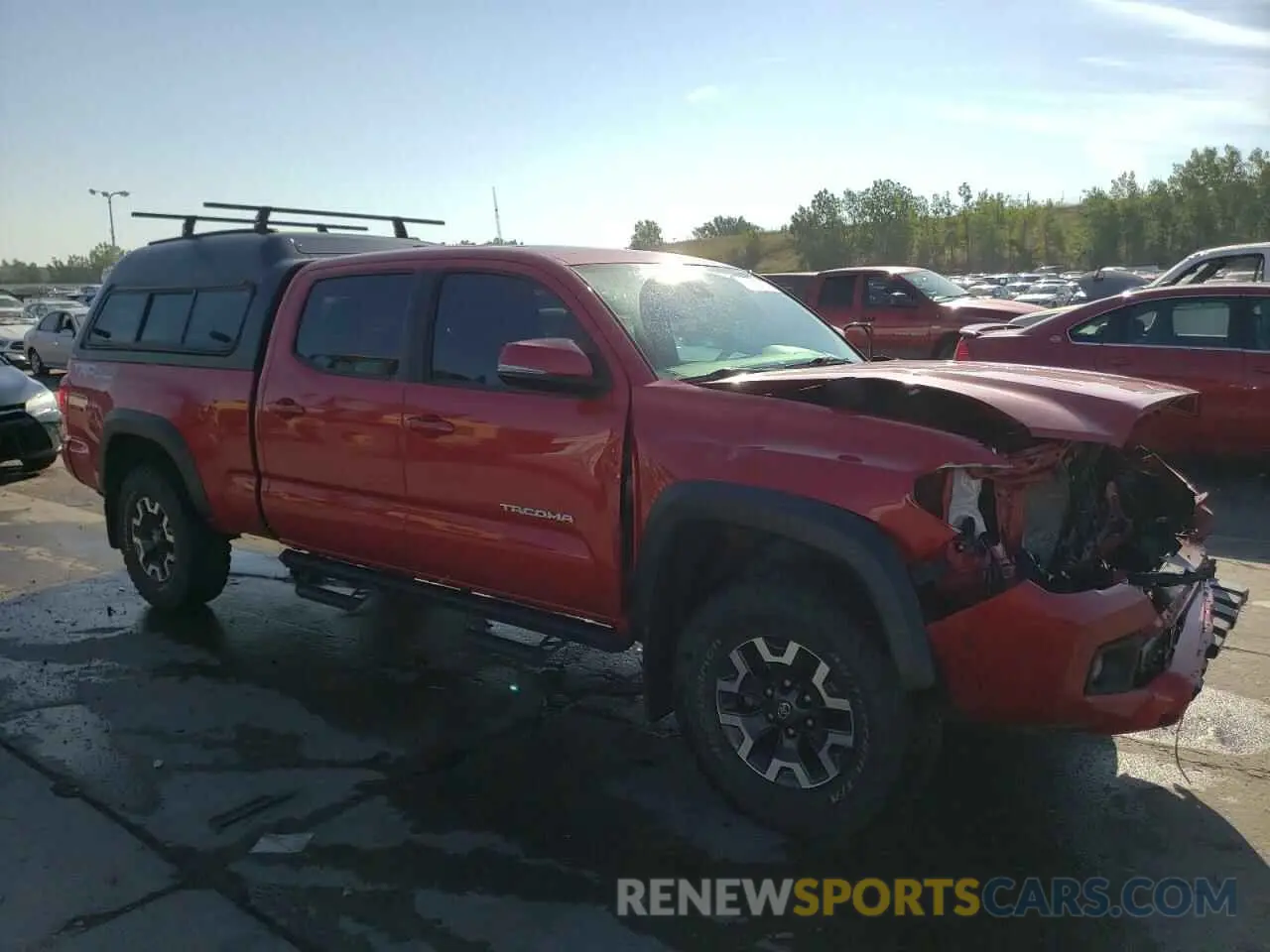 4 Photograph of a damaged car 3TMDZ5BN5KM065648 TOYOTA TACOMA 2019
