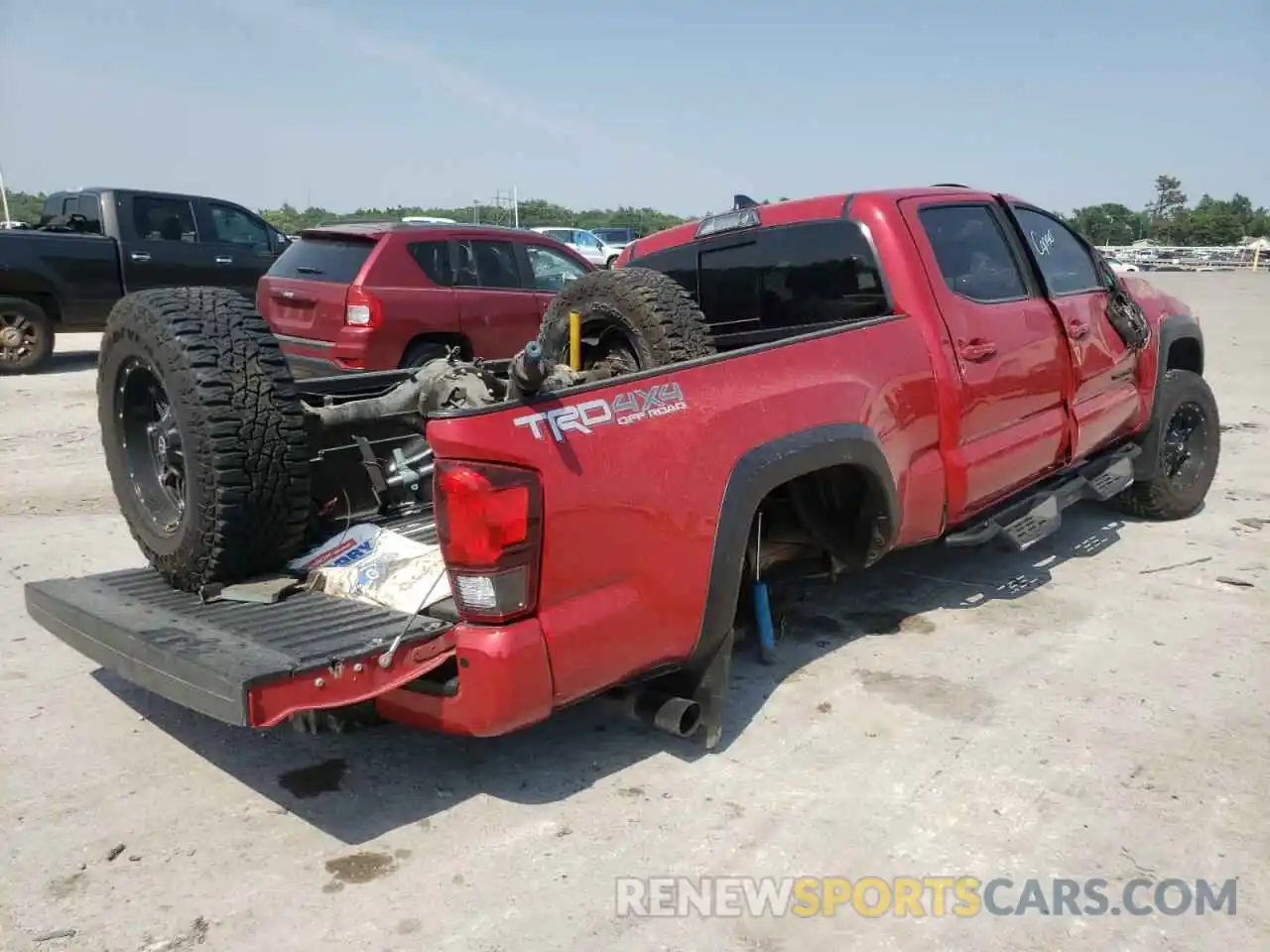 4 Photograph of a damaged car 3TMDZ5BN5KM074673 TOYOTA TACOMA 2019