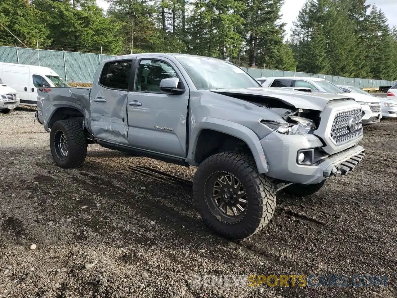 4 Photograph of a damaged car 3TMDZ5BN5KM076293 TOYOTA TACOMA 2019