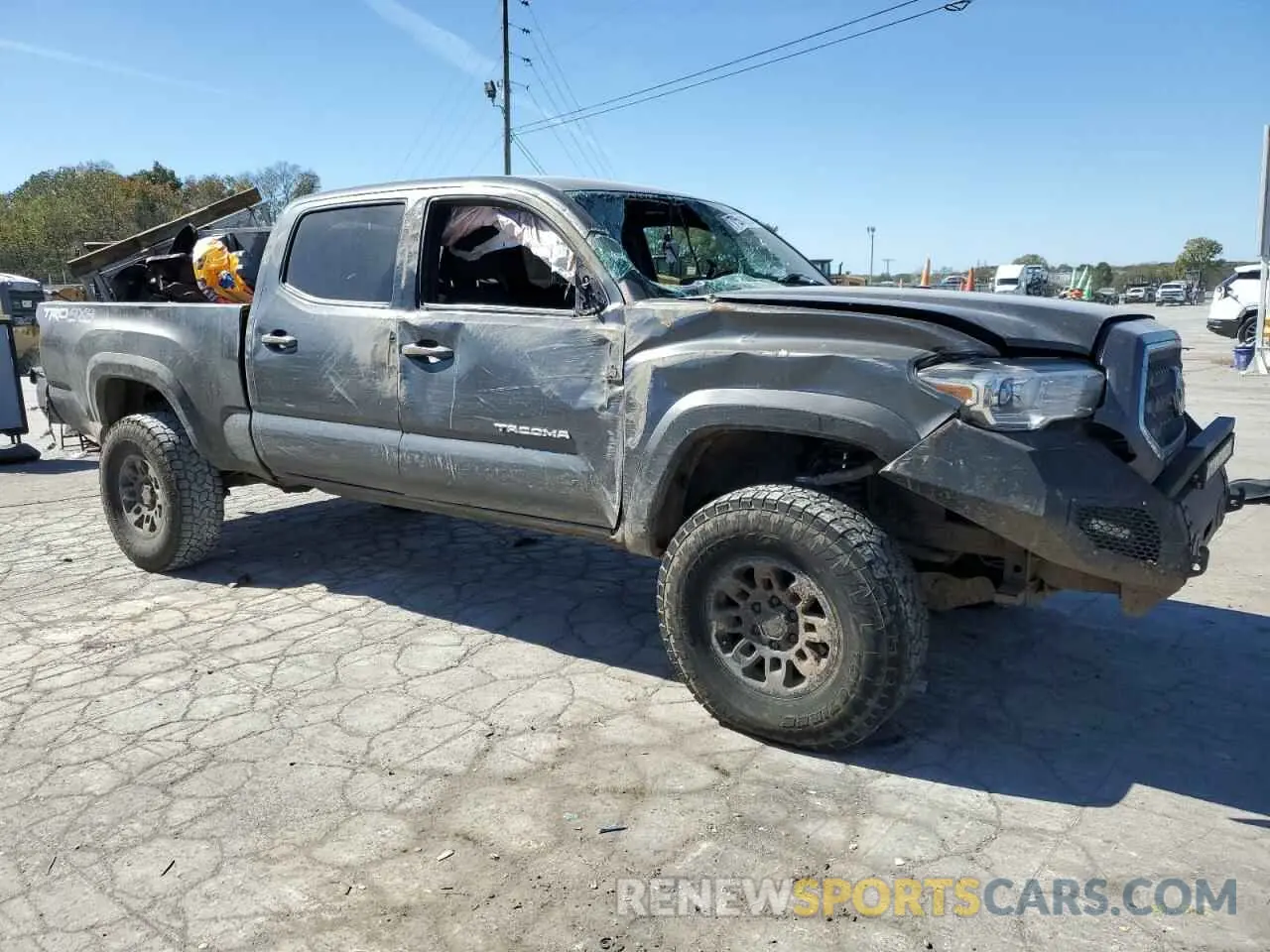 4 Photograph of a damaged car 3TMDZ5BN6KM066680 TOYOTA TACOMA 2019